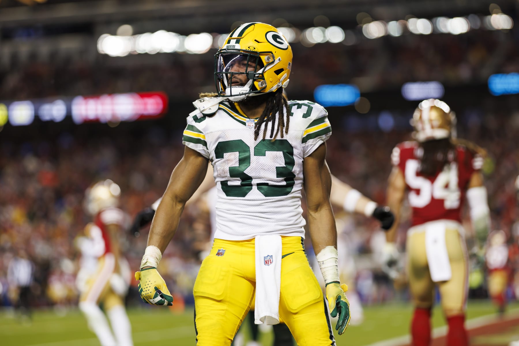 SANTA CLARA, CALIFORNIA - JANUARY 20: Aaron Jones #33 of the Green Bay Packers celebrates after scoring on a two-point conversion during an NFC divisional round playoff football game against the San Francisco 49ers at Levi's Stadium on January 20, 2024 in Santa Clara, California. (Photo by Ryan Kang/Getty Images)