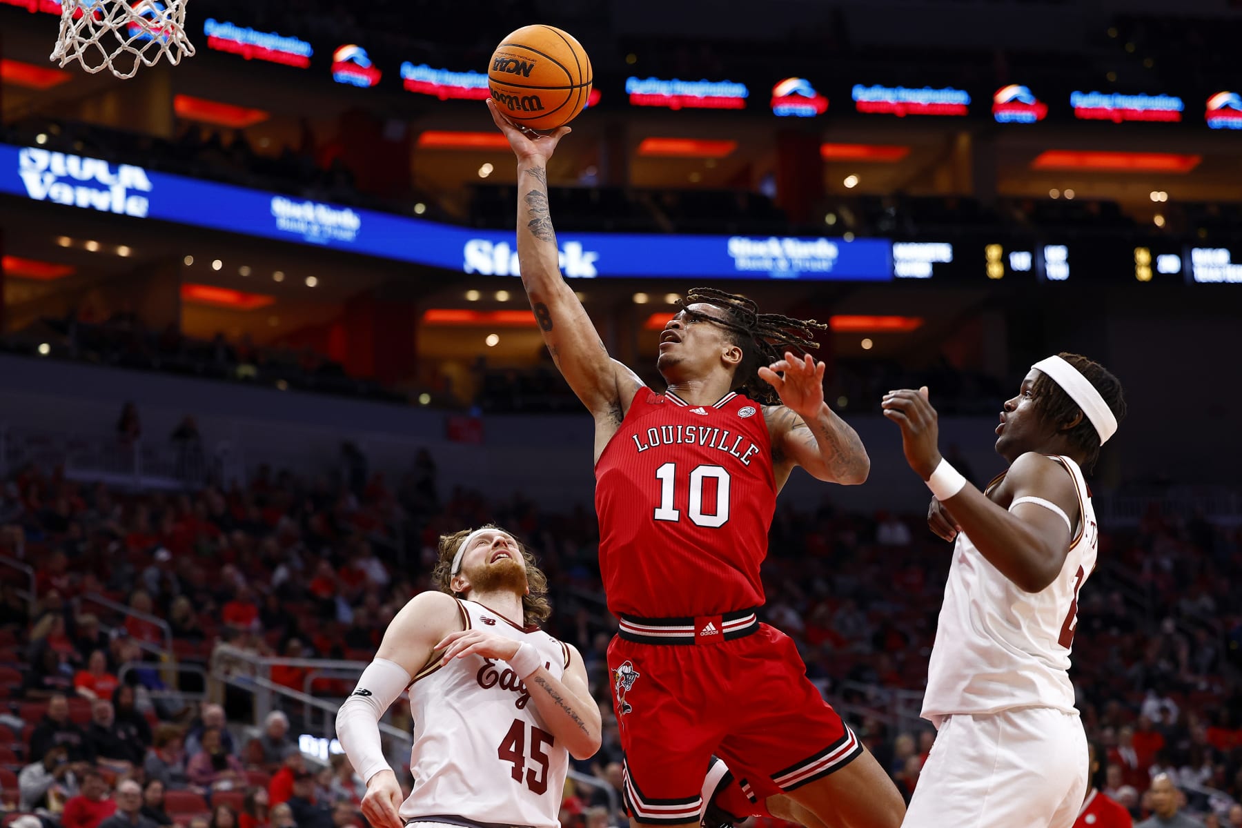 LOUISVILLE, KY - MARCH 09: Louisville Cardinals forward Kaleb Glenn (10) drives down the lane and goes in for the lay up during a mens college basketball game between the Boston College Eagles and the Louisville Cardinals on March 09, 2024 at the KFC Yum! Center in Louisville, KY.  (Photo by Jeffrey Brown/Icon Sportswire via Getty Images)