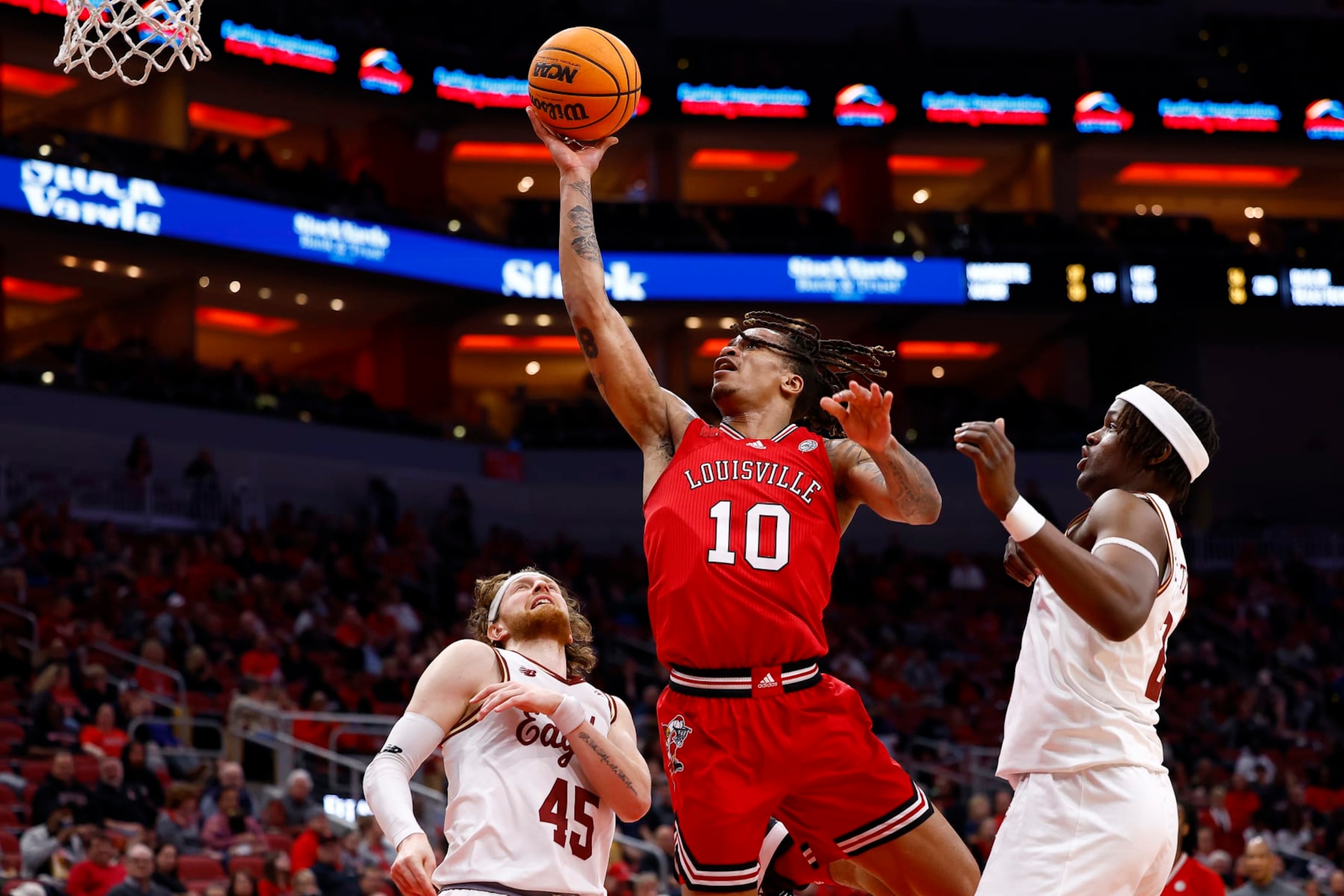 LOUISVILLE, KY - MARCH 09: Louisville Cardinals forward Kaleb Glenn (10) drives down the lane and goes in for the lay up during a mens college basketball game between the Boston College Eagles and the Louisville Cardinals on March 09, 2024 at the KFC Yum! Center in Louisville, KY.  (Photo by Jeffrey Brown/Icon Sportswire via Getty Images)