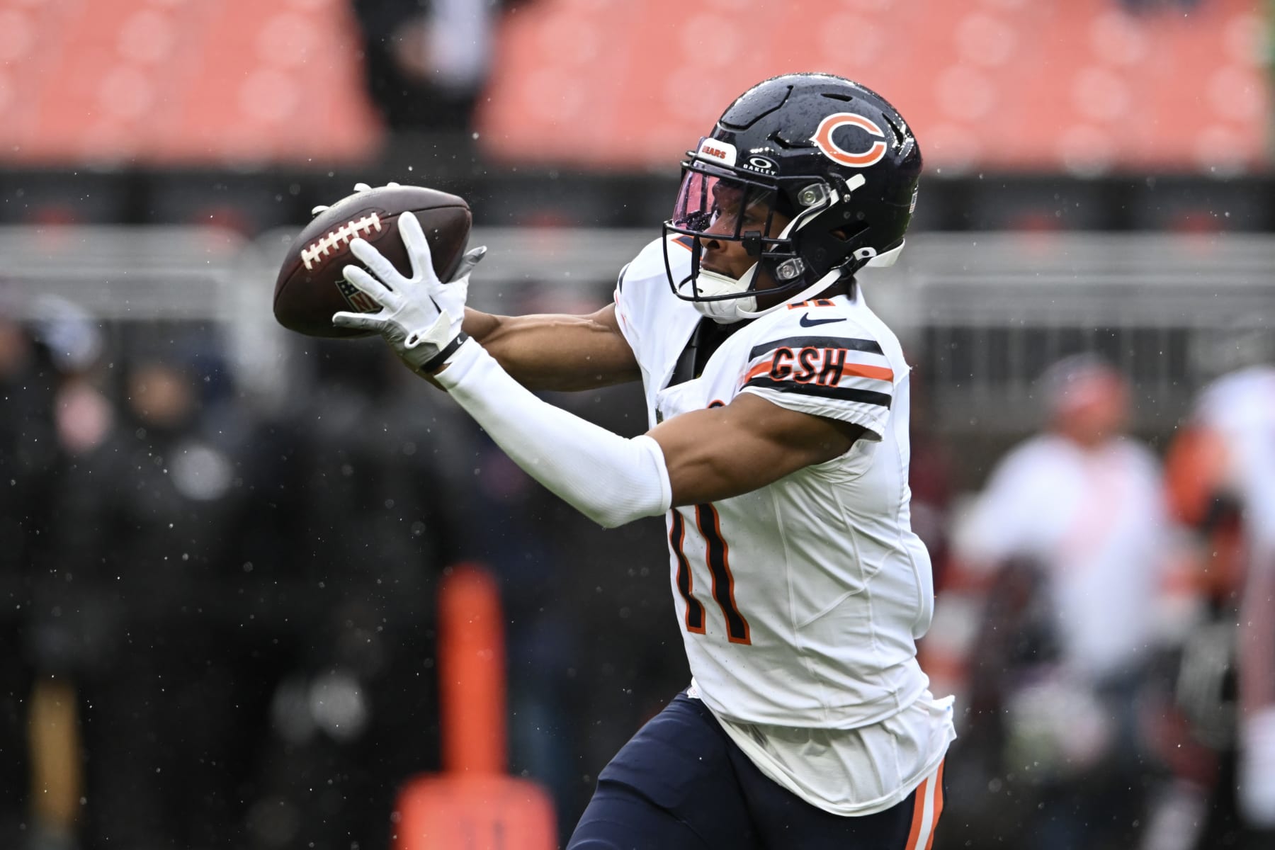 CLEVELAND, OHIO - DECEMBER 17: Darnell Mooney #11 of the Chicago Bears warms up prior to a game against the Cleveland Browns at Cleveland Browns Stadium on December 17, 2023 in Cleveland, Ohio. (Photo by Nick Cammett/Getty Images)