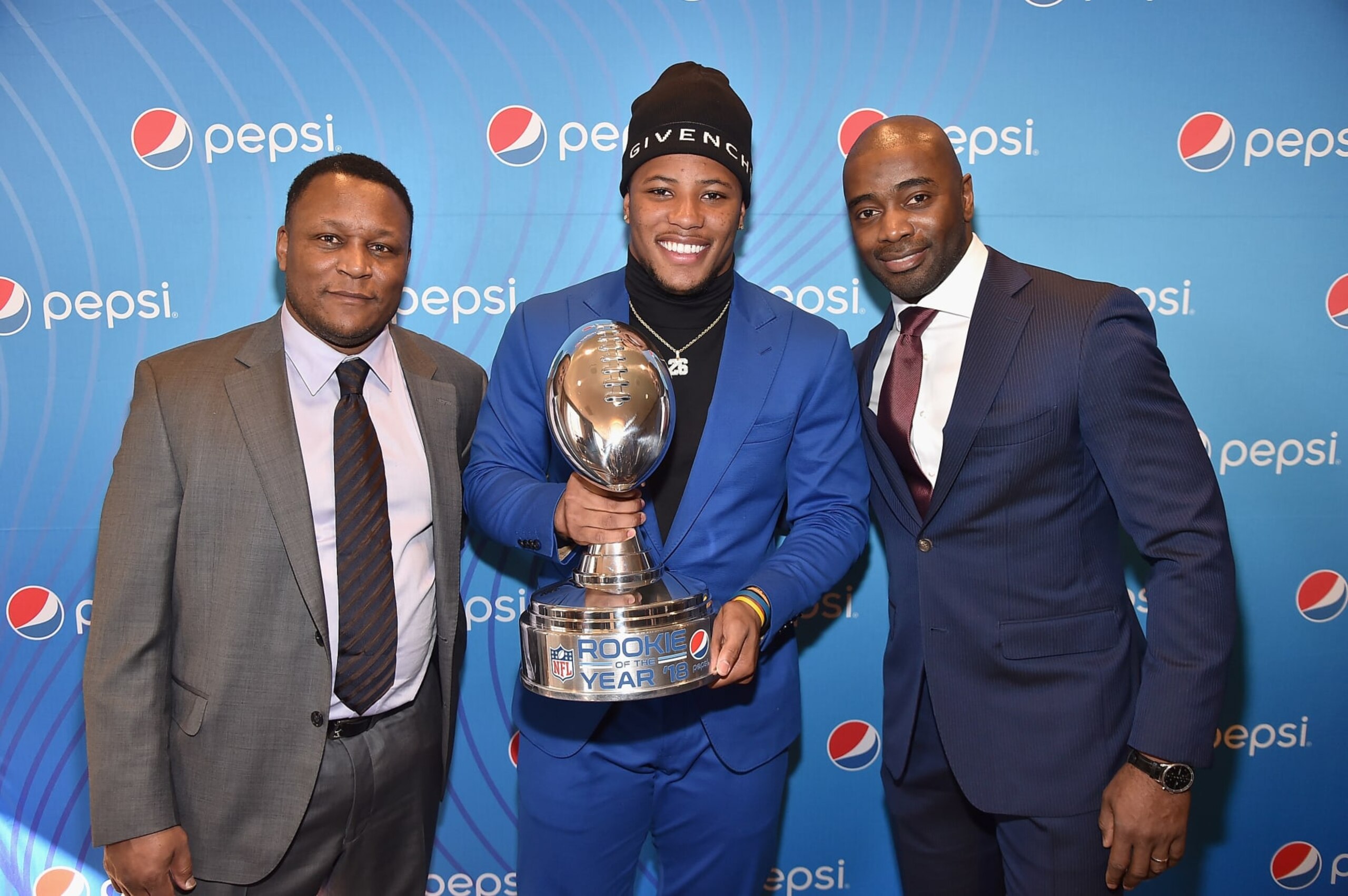 ATLANTA, GA - JANUARY 31:  (L-R) Barry Sanders, Saquon Barkley Curtis Martin and attend the Pepsi Rookie Brunch Celebrating Saquon Barkley as 2018 Pepsi NFL Rookie of The Year at the Ritz Carlton on February 1, 2019 in Atlanta, Georgia.  (Photo by Theo Wargo/Getty Images for Pepsi)