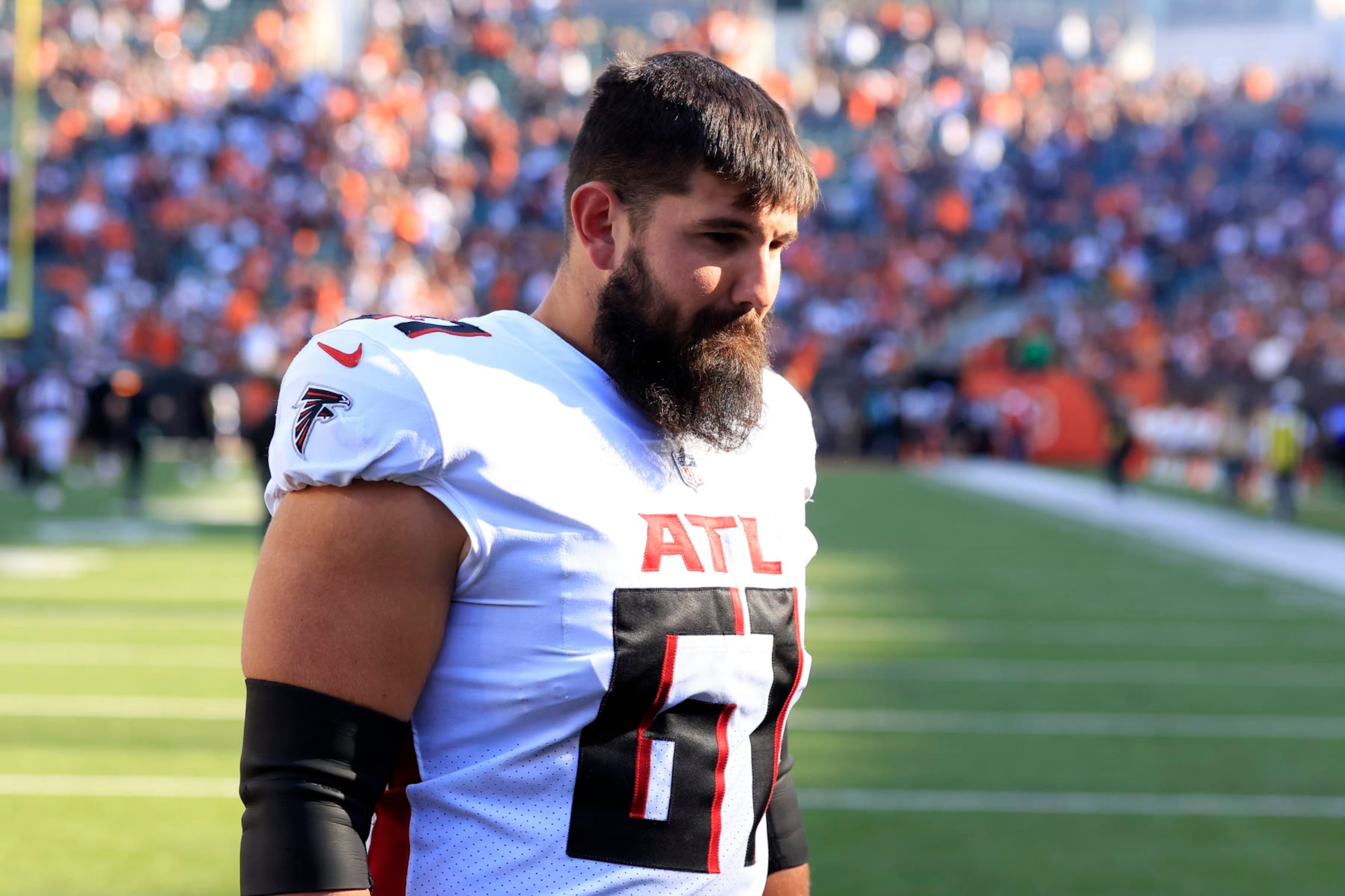 CINCINNATI, OHIO - OCTOBER 23: Matt Hennessy #61 of the Atlanta Falcons walks off the field after the game acb at Paul Brown Stadium on October 23, 2022 in Cincinnati, Ohio. (Photo by Justin Casterline/Getty Images)