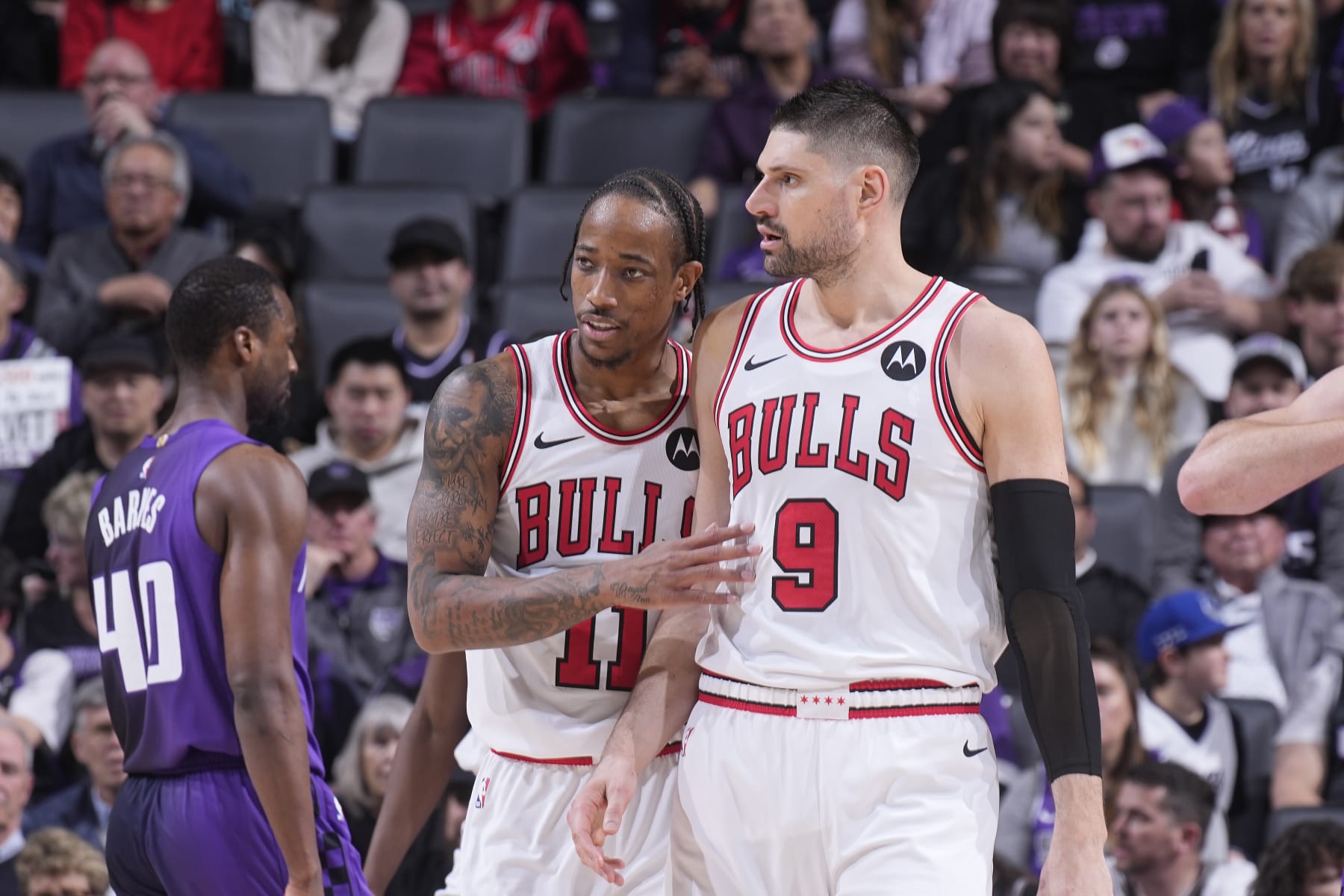 SACRAMENTO, CA - MARCH 4: DeMar DeRozan #11 and Nikola Vucevic #9 of the Chicago Bulls talk during the game against the Sacramento Kings on March 4, 2024 at Golden 1 Center in Sacramento, California. NOTE TO USER: User expressly acknowledges and agrees that, by downloading and or using this photograph, User is consenting to the terms and conditions of the Getty Images Agreement. Mandatory Copyright Notice: Copyright 2024 NBAE (Photo by Rocky Widner/NBAE via Getty Images)