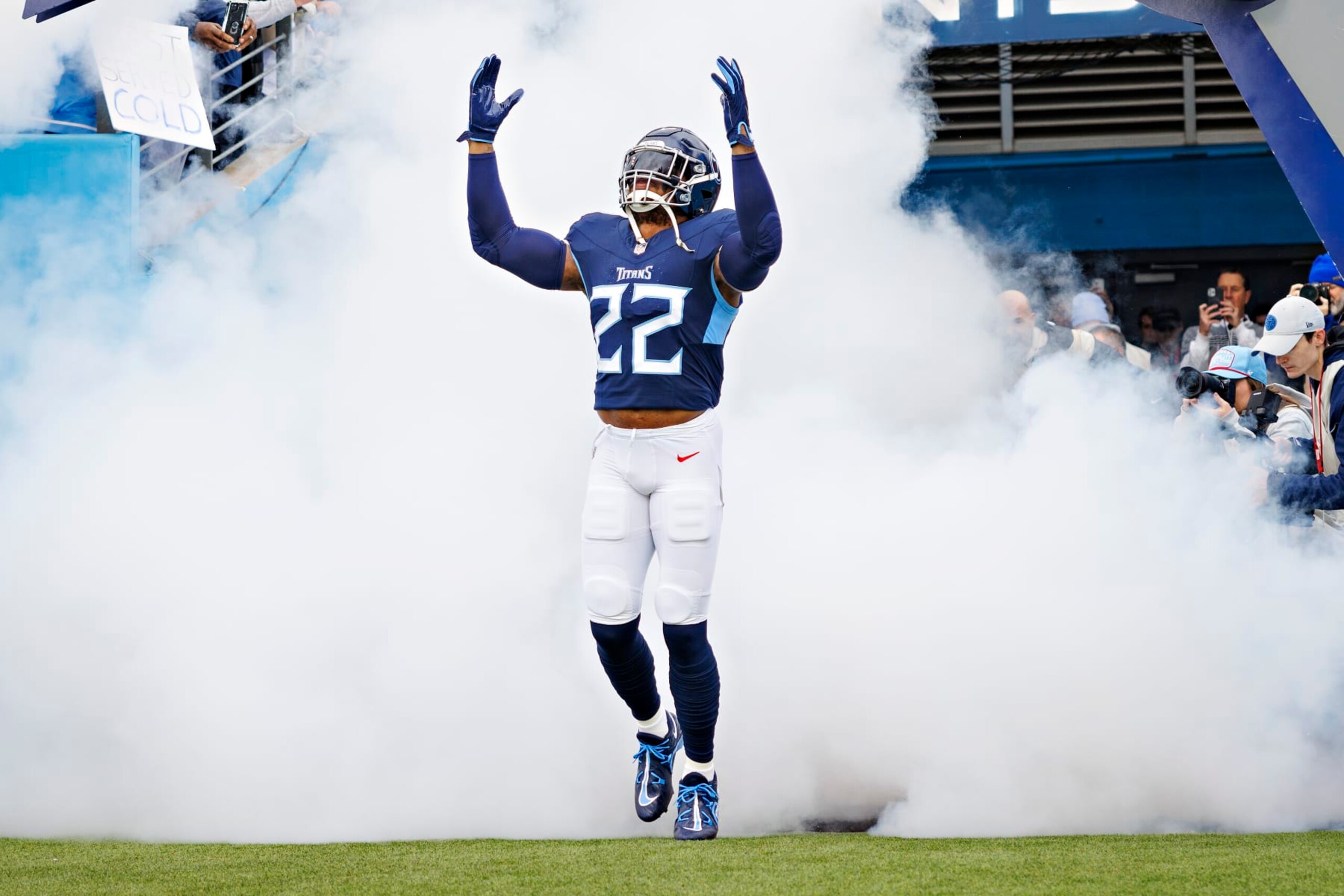 NASHVILLE TENNESSEE - JANUARY 07: Derrick Henry #22 of the Tennessee Titans during introductions before the game against the Jacksonville Jaguars in Nashville, Tennessee at Nissan Stadium on January 7, 2024 in Houston, Texas. The Titans defeated the Jaguars 28-20.  (Photo by Wesley Hitt/Getty Images)