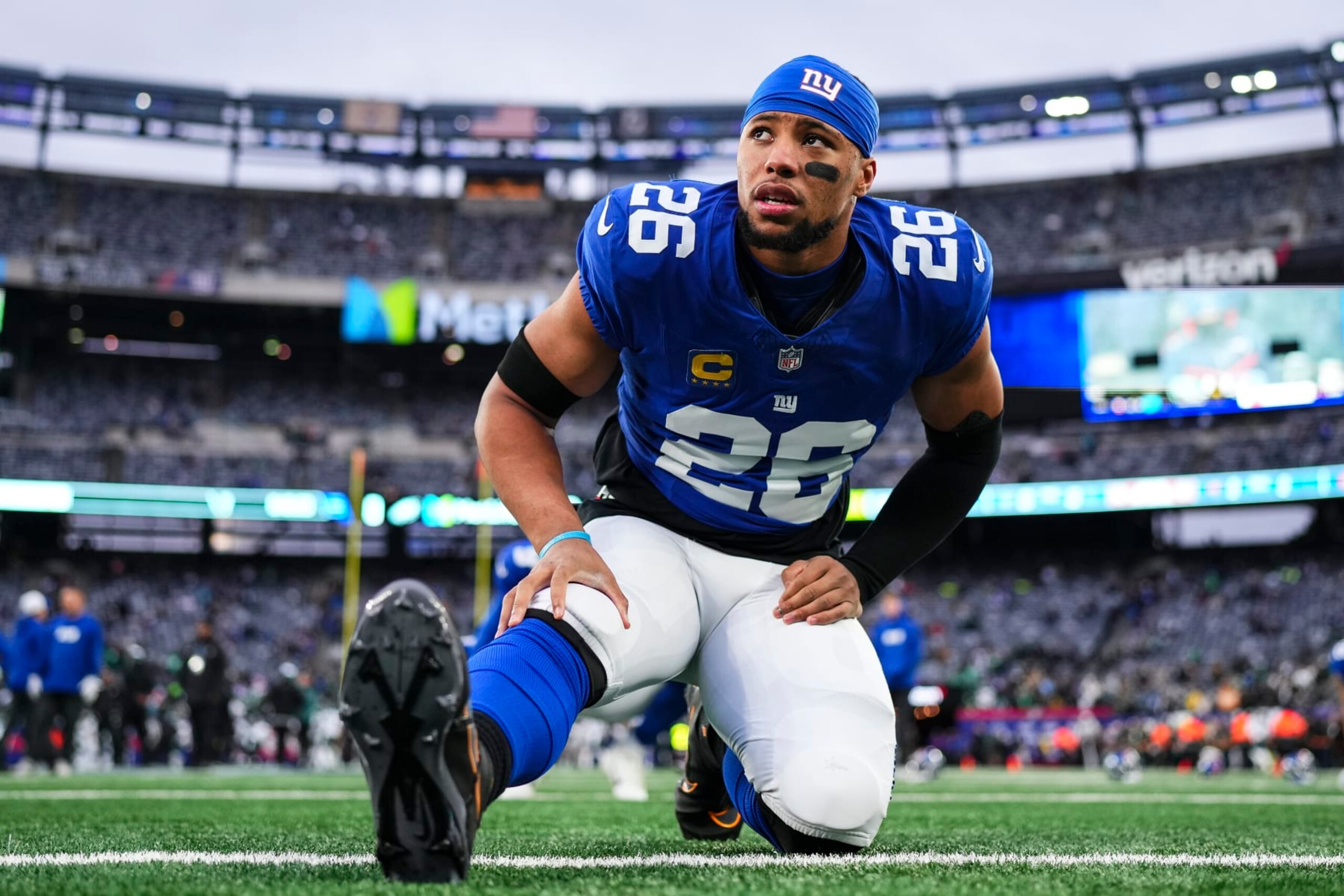 EAST RUTHERFORD, NJ - JANUARY 07: Saquon Barkley #26 of the New York Giants warms up prior to an NFL football game against the Philadelphia Eagles at MetLife Stadium on January 7, 2024 in East Rutherford, New Jersey. (Photo by Cooper Neill/Getty Images) EAST RUTHERFORD, NJ - JANUARY 07: Saquon Barkley #26 of the New York Giants warms up prior to an NFL football game against the Philadelphia Eagles at MetLife Stadium on January 7, 2024 in East Rutherford, New Jersey. (Photo by Cooper Neill/Getty Images)