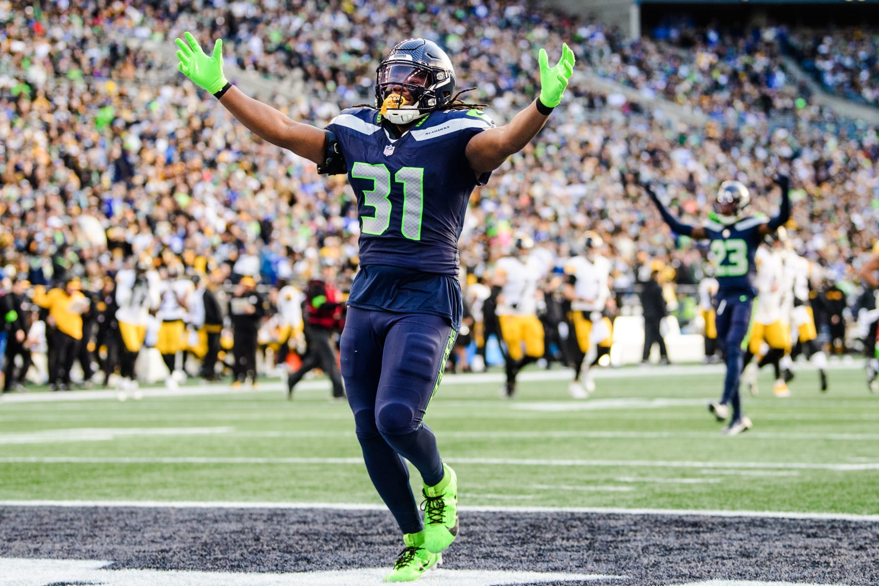 SEATTLE, WASHINGTON - DECEMBER 31: DeeJay Dallas #31 of the Seattle Seahawks celebrates towards the crowd during the second quarter of the game against the Pittsburgh Steelers at Lumen Field on December 31, 2023 in Seattle, Washington. (Photo by Jane Gershovich/Getty Images) SEATTLE, WASHINGTON - DECEMBER 31: DeeJay Dallas #31 of the Seattle Seahawks celebrates towards the crowd during the second quarter of the game against the Pittsburgh Steelers at Lumen Field on December 31, 2023 in Seattle, Washington. (Photo by Jane Gershovich/Getty Images)