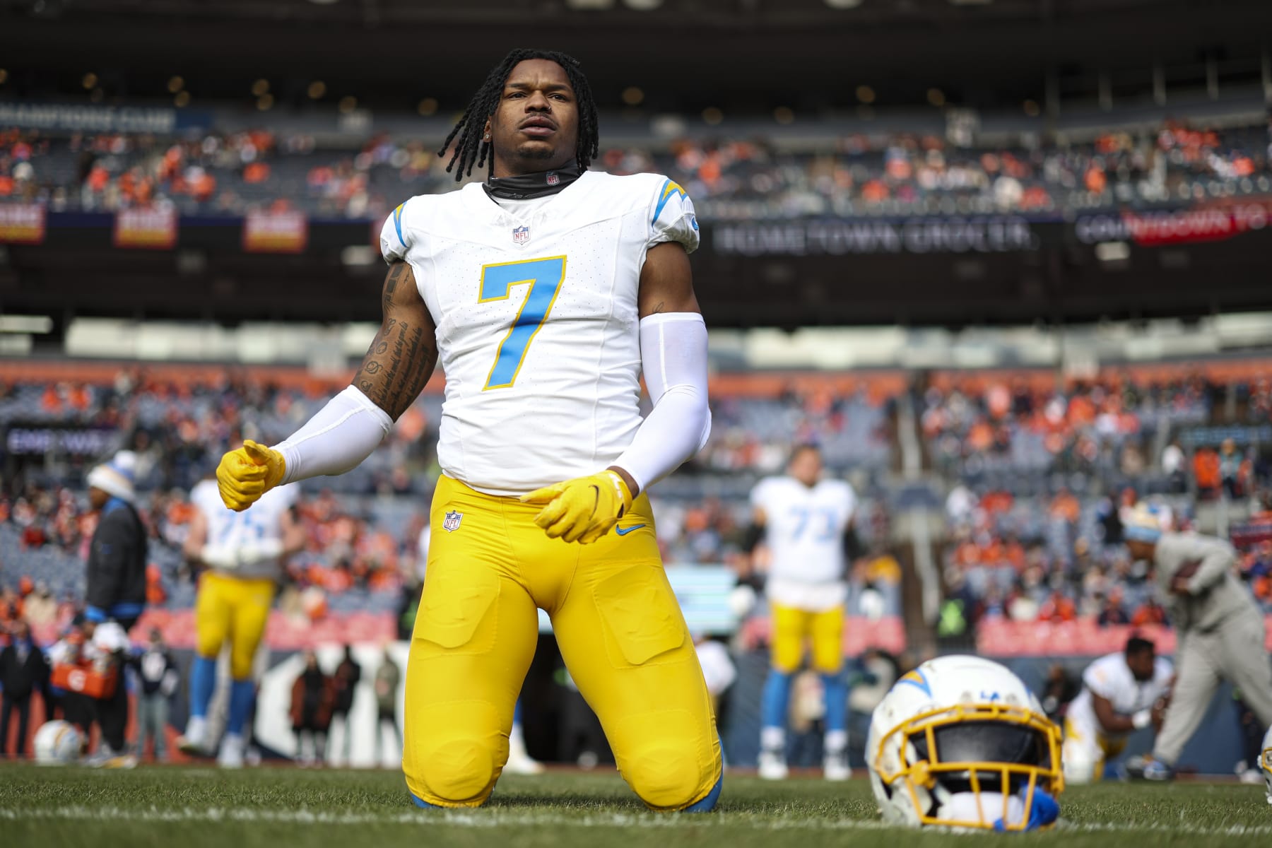 DENVER, CO - DECEMBER 31: Gerald Everett #7 of the Los Angeles Chargers warms up prior to an NFL football game against the Denver Broncos at Empower Field at Mile High on December 31, 2023 in Denver, Colorado. (Photo by Perry Knotts/Getty Images)