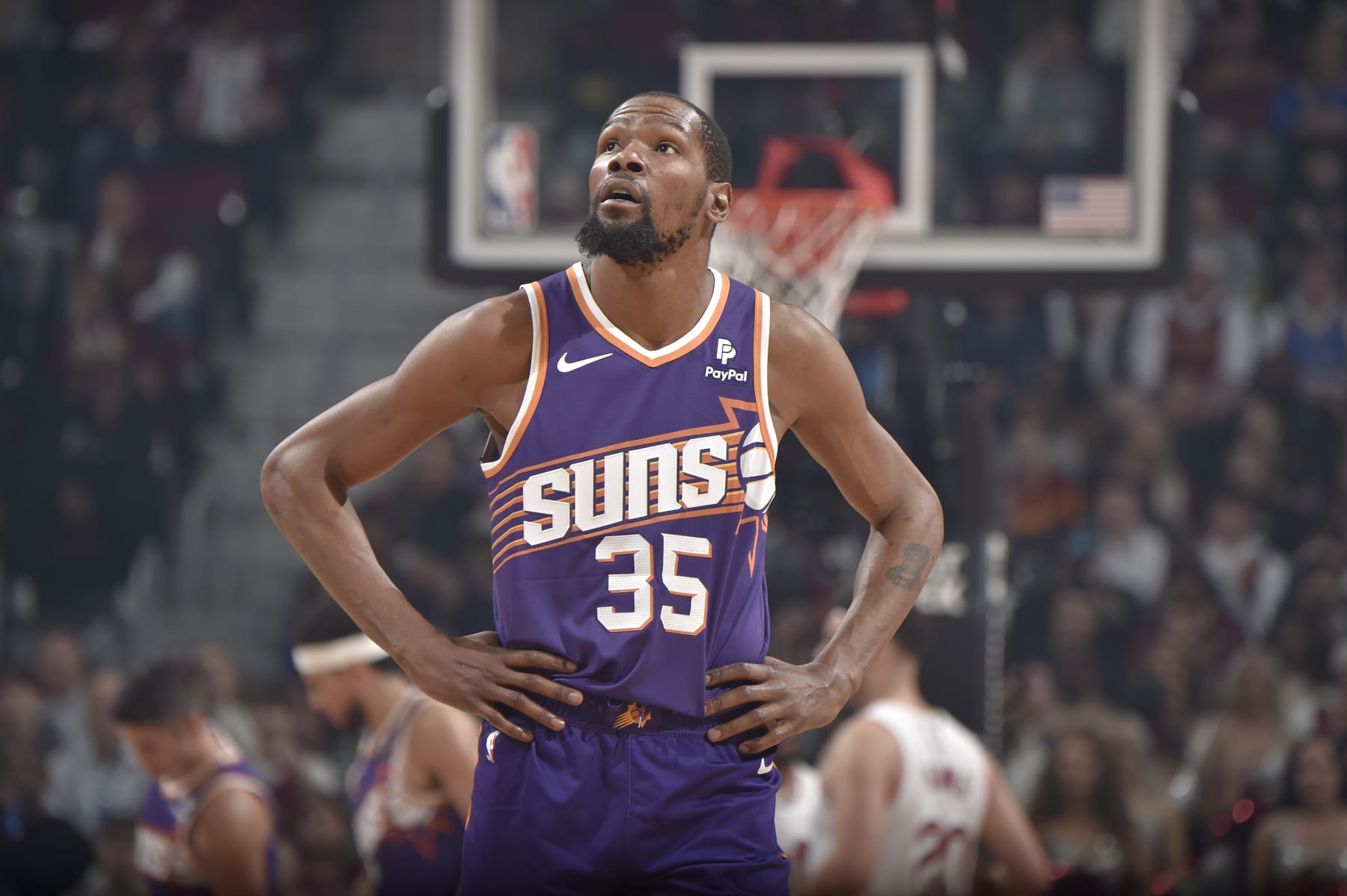 CLEVELAND, OH - MARCH 11:  Kevin Durant #35 of the Phoenix Suns looks on during the game against the Cleveland Cavaliers on March 11, 2024 at Rocket Mortgage FieldHouse in Cleveland, Ohio. NOTE TO USER: User expressly acknowledges and agrees that, by downloading and/or using this Photograph, user is consenting to the terms and conditions of the Getty Images License Agreement. Mandatory Copyright Notice: Copyright 2024 NBAE (Photo by David Liam Kyle/NBAE via Getty Images)