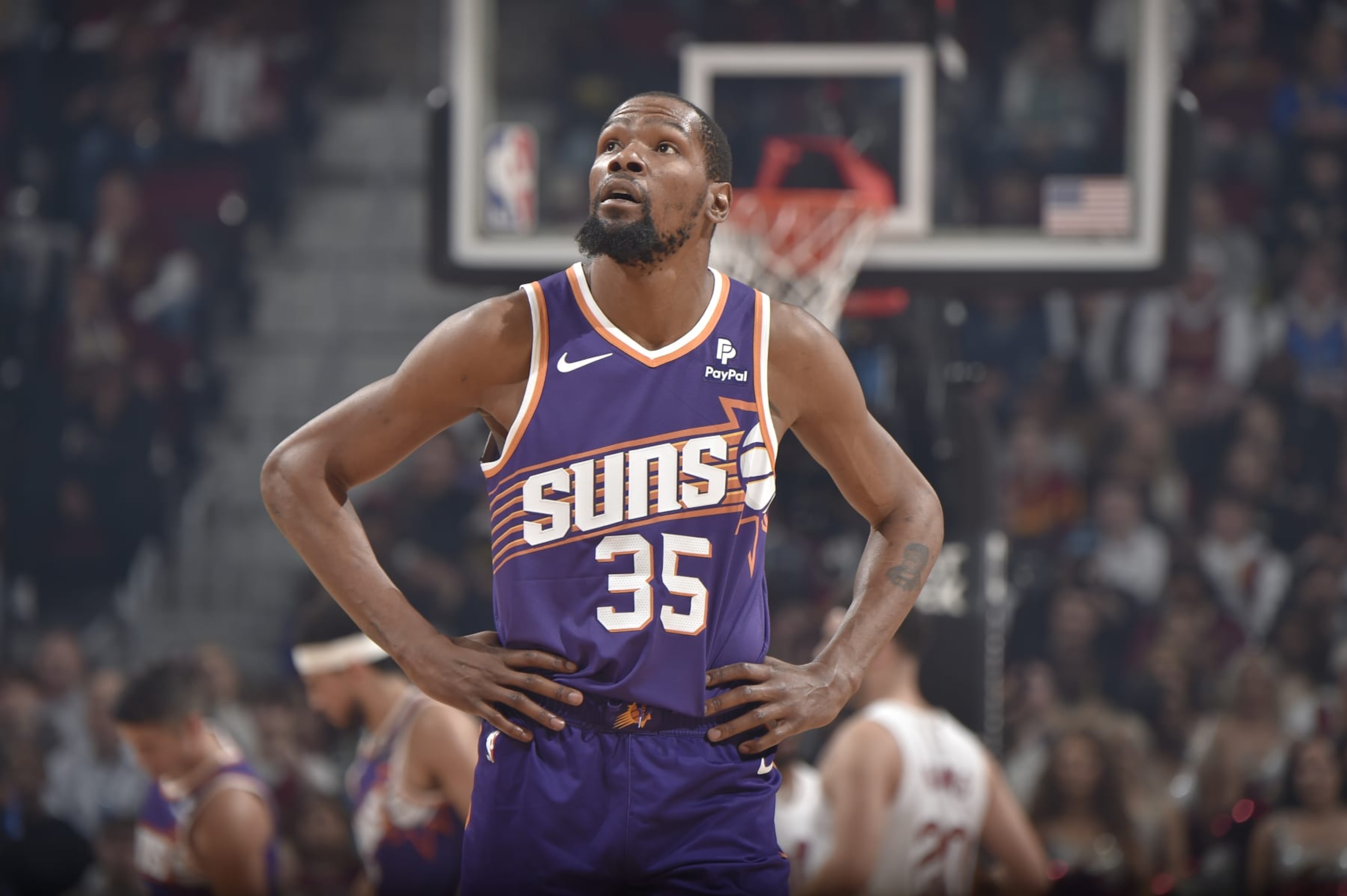 CLEVELAND, OH - MARCH 11: Kevin Durant #35 of the Phoenix Suns looks on during the game against the Cleveland Cavaliers on March 11, 2024 at Rocket Mortgage FieldHouse in Cleveland, Ohio. NOTE TO USER: User expressly acknowledges and agrees that, by downloading and/or using this Photograph, user is consenting to the terms and conditions of the Getty Images License Agreement. Mandatory Copyright Notice: Copyright 2024 NBAE (Photo by David Liam Kyle/NBAE via Getty Images) CLEVELAND, OH - MARCH 11: Kevin Durant #35 of the Phoenix Suns looks on during the game against the Cleveland Cavaliers on March 11, 2024 at Rocket Mortgage FieldHouse in Cleveland, Ohio. NOTE TO USER: User expressly acknowledges and agrees that, by downloading and/or using this Photograph, user is consenting to the terms and conditions of the Getty Images License Agreement. Mandatory Copyright Notice: Copyright 2024 NBAE (Photo by David Liam Kyle/NBAE via Getty Images)
