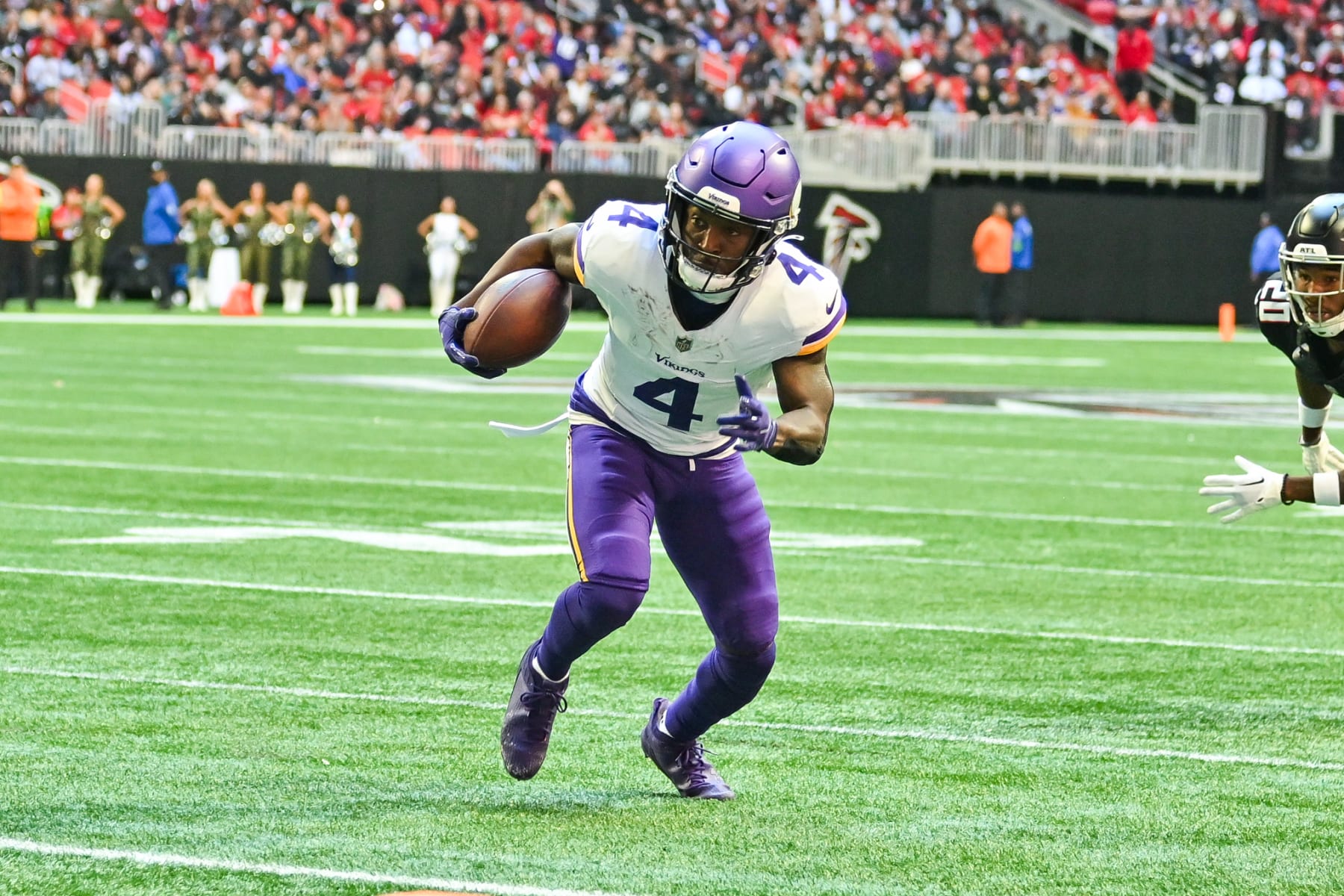 ATLANTA, GA NOVEMBER 05: Minnesota wide receiver Brandon Powell (4) runs with the ball after a reception during the NFL game between the Minnesota Vikings and the Atlanta Falcons on November 5th, 2023 at Mercedes-Benz Stadium in Atlanta, GA. (Photo by Rich von Biberstein/Icon Sportswire via Getty Images) ATLANTA, GA NOVEMBER 05: Minnesota wide receiver Brandon Powell (4) runs with the ball after a reception during the NFL game between the Minnesota Vikings and the Atlanta Falcons on November 5th, 2023 at Mercedes-Benz Stadium in Atlanta, GA. (Photo by Rich von Biberstein/Icon Sportswire via Getty Images)