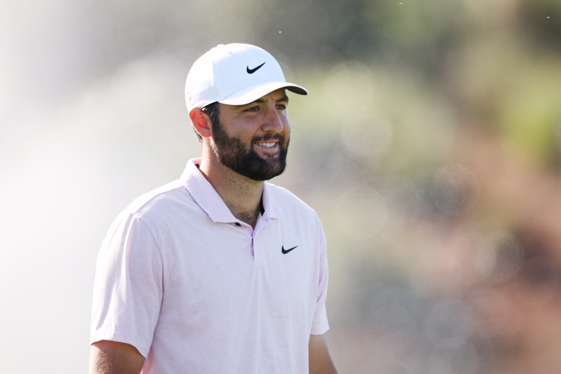 PONTE VEDRA BEACH, FLORIDA - MARCH 12:  Scottie Scheffler of the United States walks the chipping area during a practice round prior to THE PLAYERS Championship on the Stadium Course at TPC Sawgrass on March 12, 2024 in Ponte Vedra Beach, Florida. (Photo by Jared C. Tilton/Getty Images)