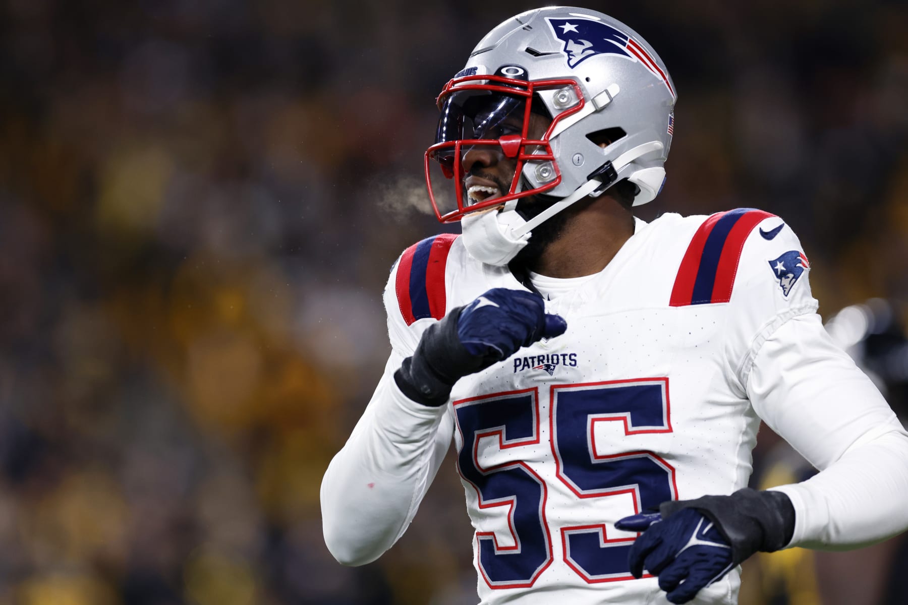Pittsburgh, PA - December 7: New England Patriots LB Josh Uche celebrates a stop in the second half. The Patriots beat the Pittsburgh Steelers, 21-18. (Photo by Danielle Parhizkaran/The Boston Globe via Getty Images)