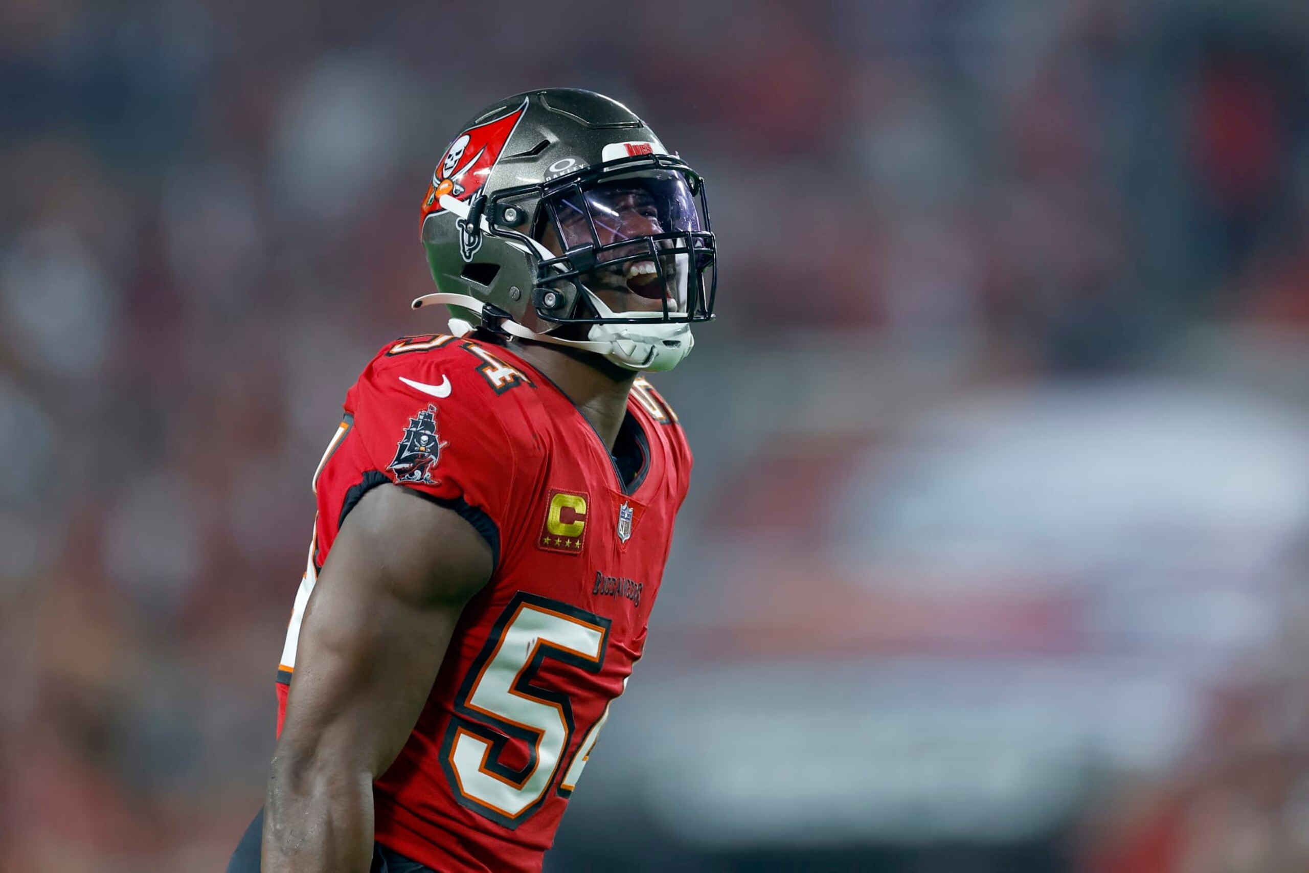TAMPA, FLORIDA - JANUARY 15: Lavonte David #54 of the Tampa Bay Buccaneers celebrates a defensive stop against the Philadelphia Eagles during the first quarter in the NFC Wild Card Playoffs at Raymond James Stadium on January 15, 2024 in Tampa, Florida. (Photo by Mike Ehrmann/Getty Images)