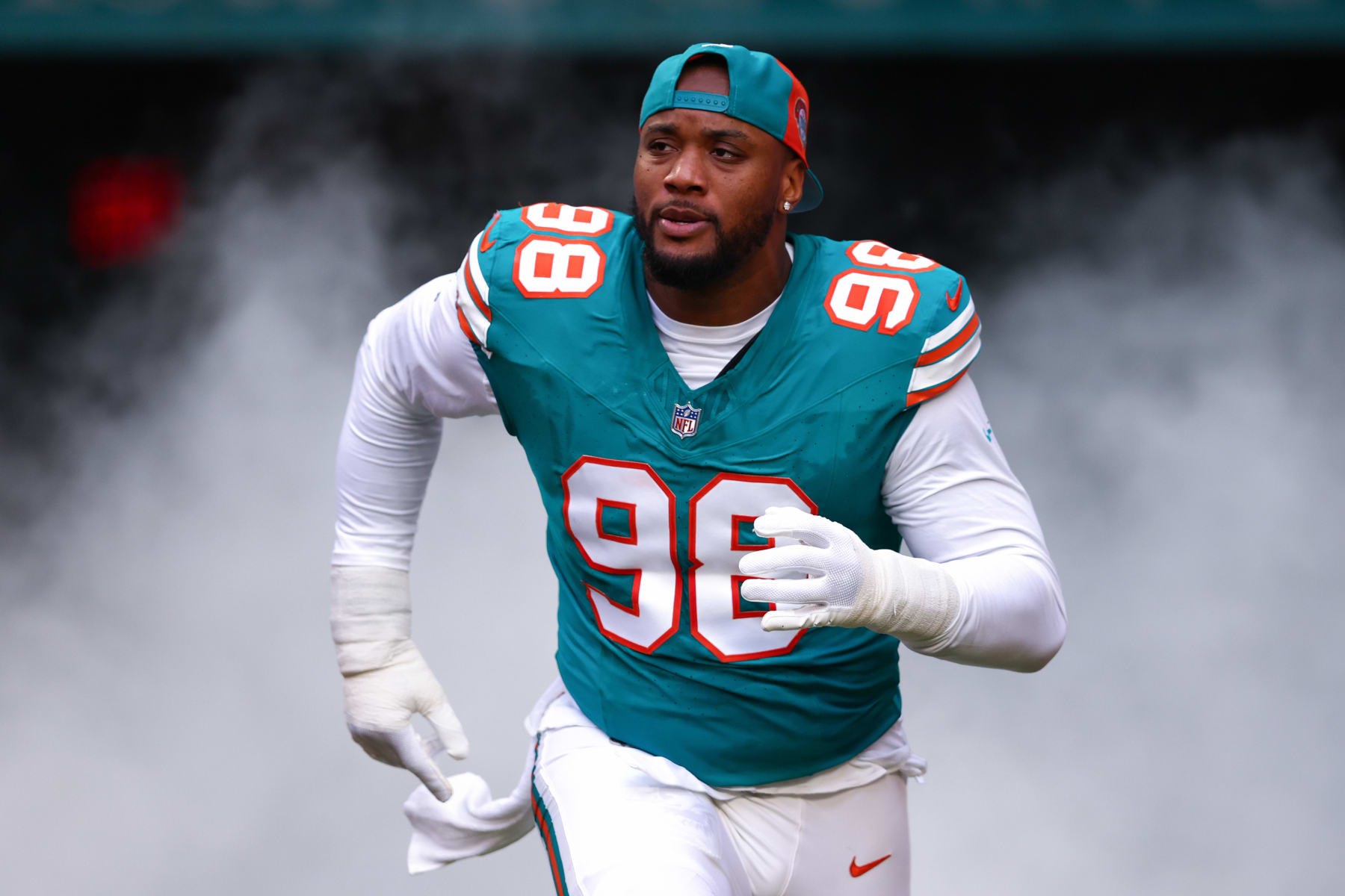 MIAMI GARDENS, FLORIDA - DECEMBER 24: Raekwon Davis #98 of the Miami Dolphins takes the field prior to a game against the Dallas Cowboys at Hard Rock Stadium on December 24, 2023 in Miami Gardens, Florida. (Photo by Megan Briggs/Getty Images)