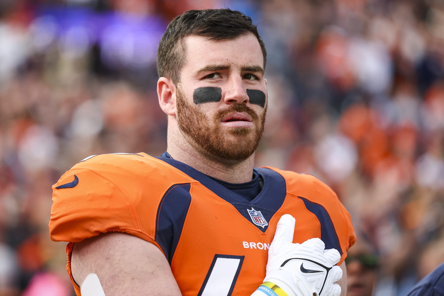 DENVER, CO - DECEMBER 31: Josey Jewell #47 of the Denver Broncos looks on from the sideline during the antional anthem prior to an NFL football game against the Los Angeles Chargers at Empower Field at Mile High on December 31, 2023 in Denver, Colorado. (Photo by Perry Knotts/Getty Images)