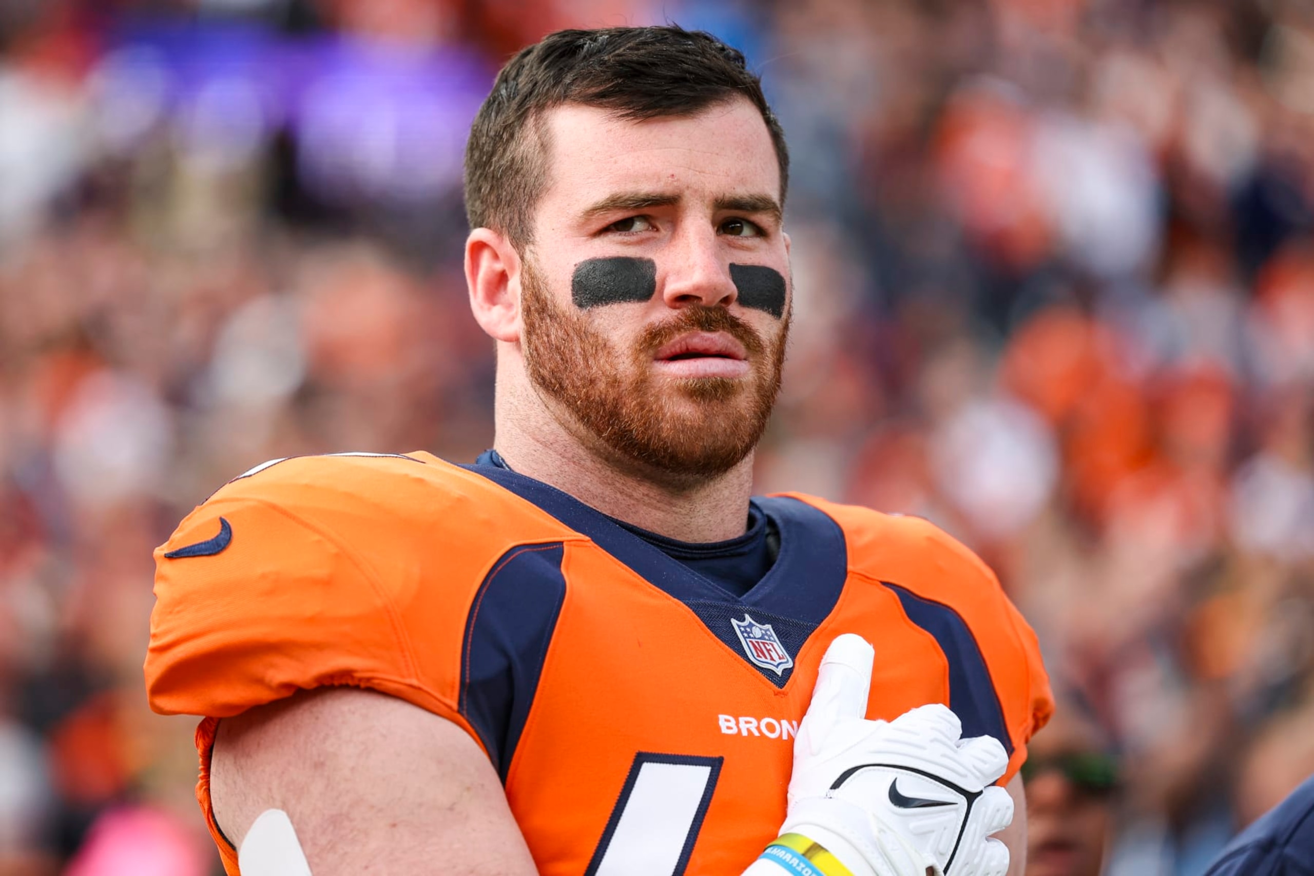 DENVER, CO - DECEMBER 31: Josey Jewell #47 of the Denver Broncos looks on from the sideline during the antional anthem prior to an NFL football game against the Los Angeles Chargers at Empower Field at Mile High on December 31, 2023 in Denver, Colorado. (Photo by Perry Knotts/Getty Images)