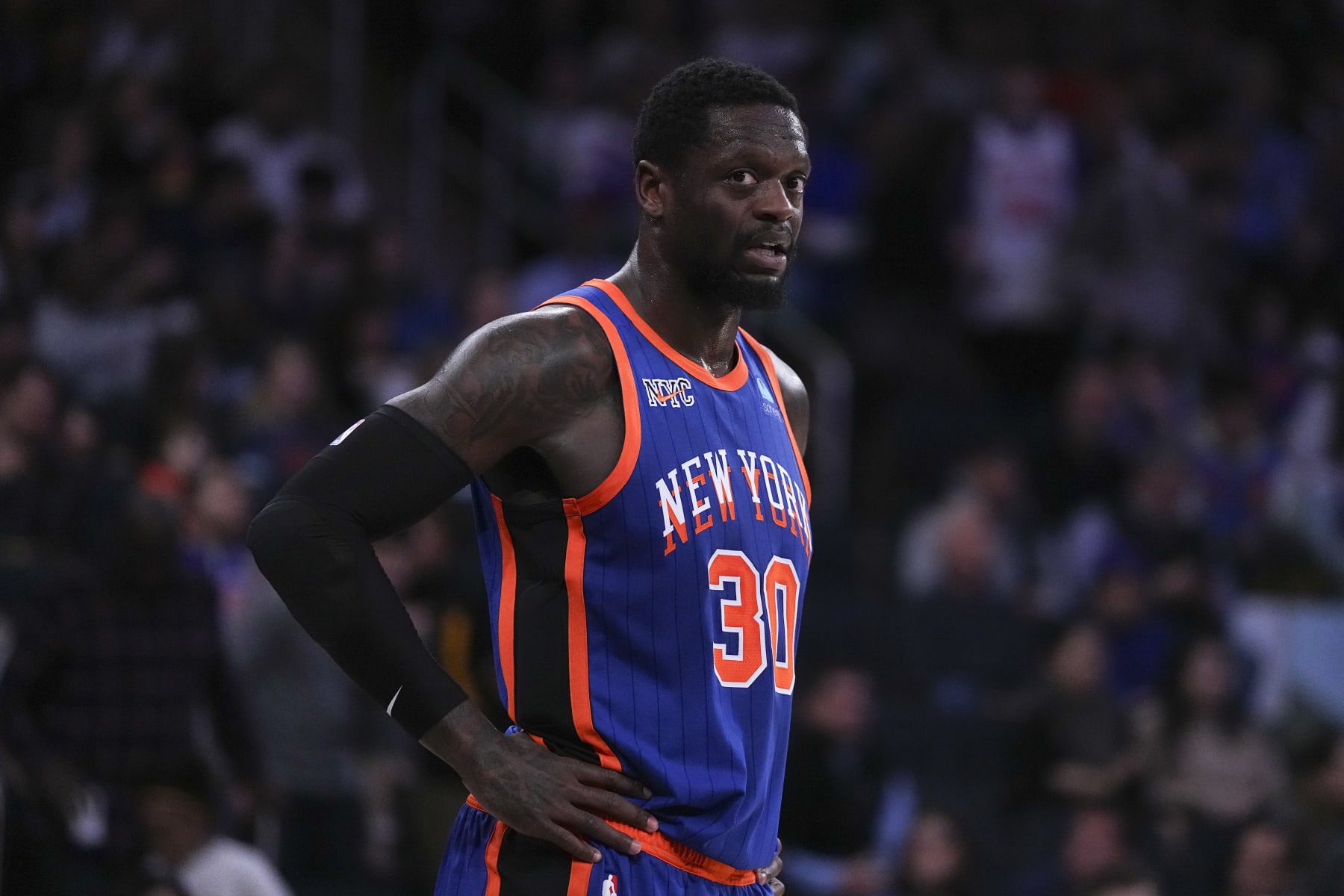 NEW YORK, NEW YORK - JANUARY 27: Julius Randle #30 of the New York Knicks looks on against the Miami Heat at Madison Square Garden on January 27, 2024 in New York City. NOTE TO USER: User expressly acknowledges and agrees that, by downloading and or using this photograph, User is consenting to the terms and conditions of the Getty Images License Agreement. (Photo by Mitchell Leff/Getty Images)