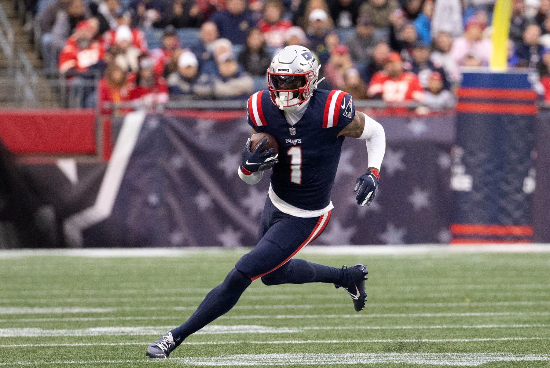 FOXBOROUGH, MA - DECEMBER 17: New England Patriots wide receiver DeVante Parker (1) carries the ball during a game between the New England Patriots and the Kansas City Chiefs on December 17, 2023, at Gillette Stadium in Foxborough, Massachusetts. (Photo by Fred Kfoury III/Icon Sportswire via Getty Images)