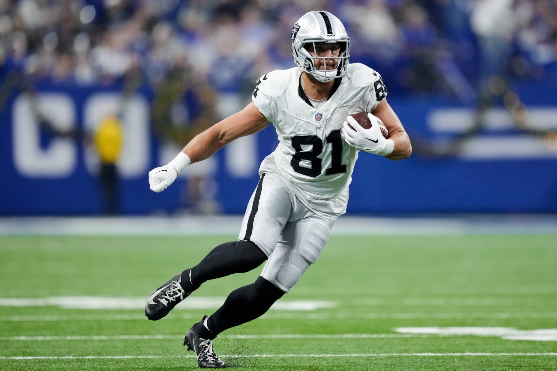 INDIANAPOLIS, INDIANA - DECEMBER 31: Austin Hooper #81 of the Las Vegas Raiders runs with the ball in the third quarter against the Indianapolis Colts at Lucas Oil Stadium on December 31, 2023 in Indianapolis, Indiana. (Photo by Dylan Buell/Getty Images) INDIANAPOLIS, INDIANA - DECEMBER 31: Austin Hooper #81 of the Las Vegas Raiders runs with the ball in the third quarter against the Indianapolis Colts at Lucas Oil Stadium on December 31, 2023 in Indianapolis, Indiana. (Photo by Dylan Buell/Getty Images)