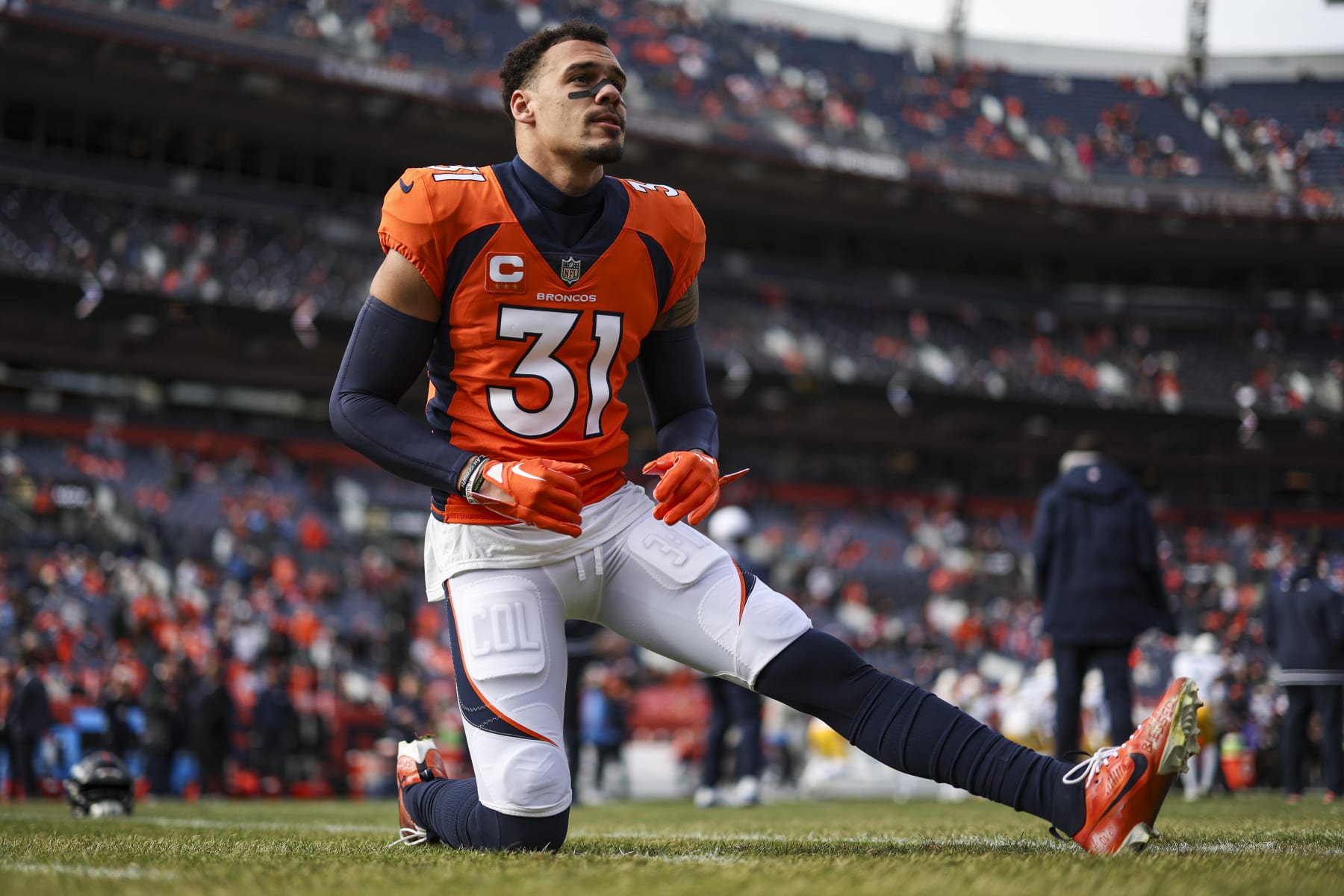 DENVER, CO - DECEMBER 31: Justin Simmons #31 of the Denver Broncos warms up prior to an NFL football game against the Los Angeles Chargers at Empower Field at Mile High on December 31, 2023 in Denver, Colorado. (Photo by Perry Knotts/Getty Images)