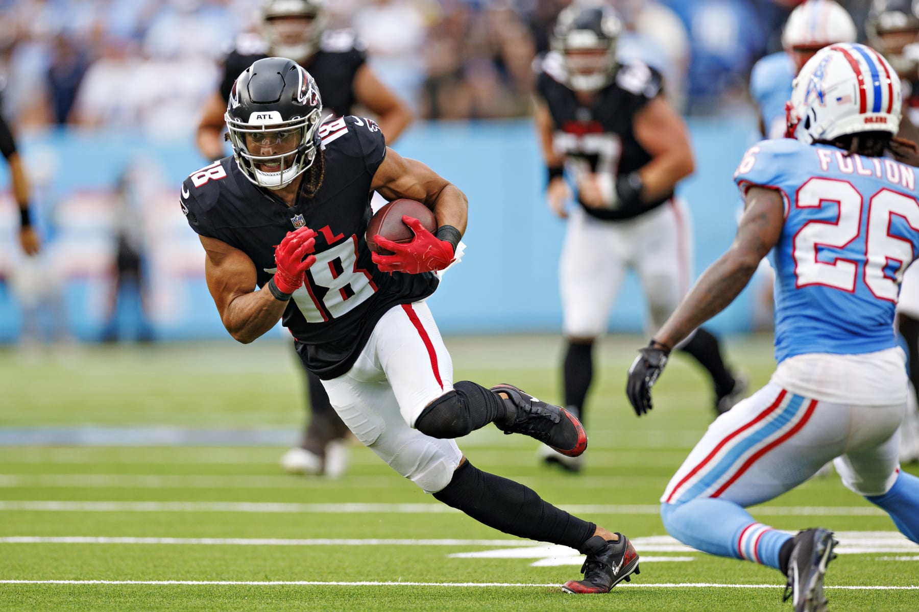 NASHVILLE, TENNESSEE - OCTOBER 29: Mack Hollins #18 of the Atlanta Falcons runs the ball during the game against the Tennessee Titans at Nissan Stadium on October 29, 2023 in Nashville, Tennessee. The Titans defeated the Falcons 28-23. (Photo by Wesley Hitt/Getty Images) NASHVILLE, TENNESSEE - OCTOBER 29: Mack Hollins #18 of the Atlanta Falcons runs the ball during the game against the Tennessee Titans at Nissan Stadium on October 29, 2023 in Nashville, Tennessee. The Titans defeated the Falcons 28-23. (Photo by Wesley Hitt/Getty Images)
