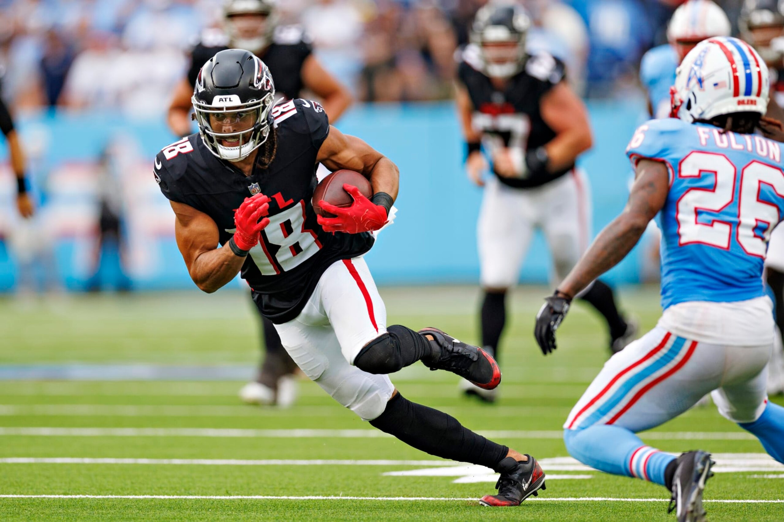 NASHVILLE, TENNESSEE - OCTOBER 29:  Mack Hollins #18 of the Atlanta Falcons runs the ball during the game against the Tennessee Titans at Nissan Stadium on October 29, 2023 in Nashville, Tennessee. The Titans defeated the Falcons 28-23. (Photo by Wesley Hitt/Getty Images)