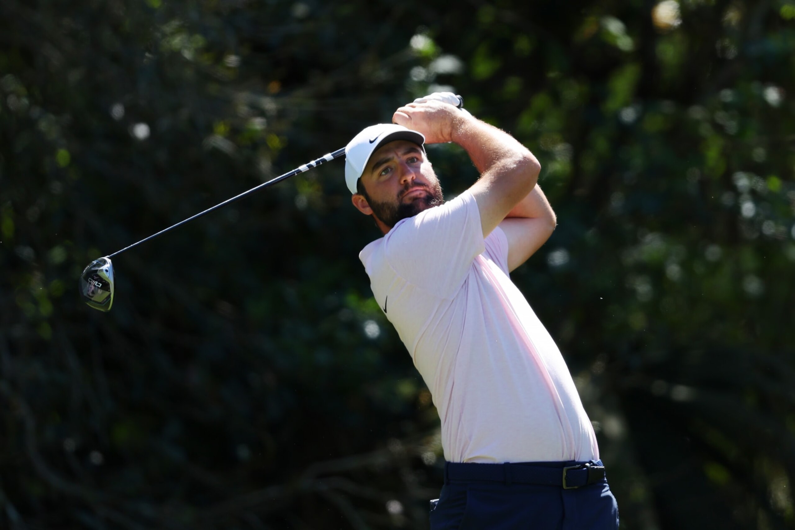 PONTE VEDRA BEACH, FLORIDA - MARCH 12:  Scottie Scheffler of the United States tees off the 15th hole during a practice round prior to THE PLAYERS Championship on the Stadium Course at TPC Sawgrass on March 12, 2024 in Ponte Vedra Beach, Florida. (Photo by Kevin C. Cox/Getty Images)
