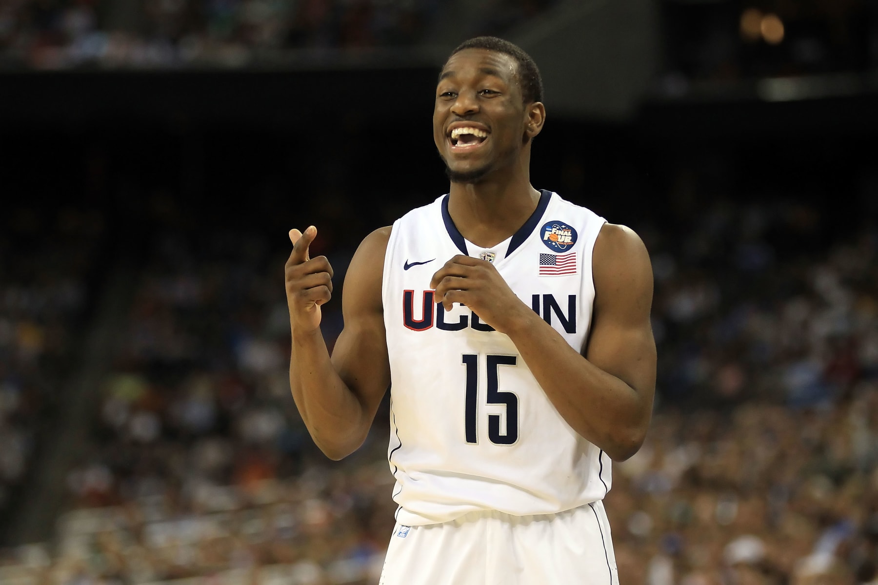 HOUSTON, TX - APRIL 04:  Kemba Walker #15 of the Connecticut Huskies reacts after a play against the Butler Bulldogs during the National Championship Game of the 2011 NCAA Division I Men's Basketball Tournament at Reliant Stadium on April 4, 2011 in Houston, Texas.  (Photo by Streeter Lecka/Getty Images)