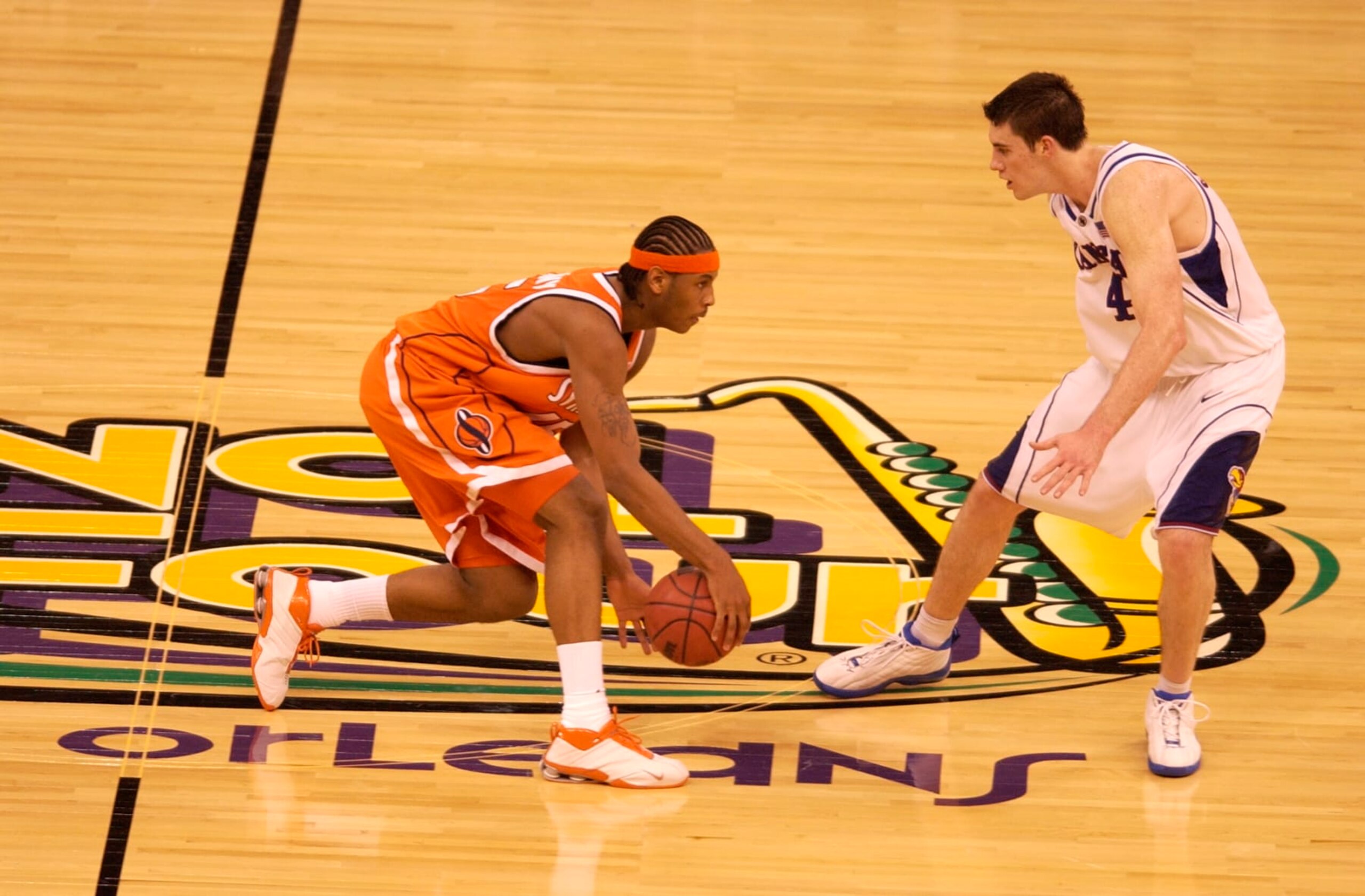 7 April 2003: Syracuse forward Carmelo Anthony (15) dribbles the ball upcourt against Kansas forward Nick Collison (4) during the Men's Division I Final Four Championships held at the Louisiana Superdome in New Orleans, LA. Syracuse University went on to defeat Kansas University 81-78 for the championship title. Photo by: Brett Wilhelm/NCAA Photos via Getty Images 7 April 2003: Syracuse forward Carmelo Anthony (15) dribbles the ball upcourt against Kansas forward Nick Collison (4) during the Men's Division I Final Four Championships held at the Louisiana Superdome in New Orleans, LA. Syracuse University went on to defeat Kansas University 81-78 for the championship title. Photo by: Brett Wilhelm/NCAA Photos via Getty Images