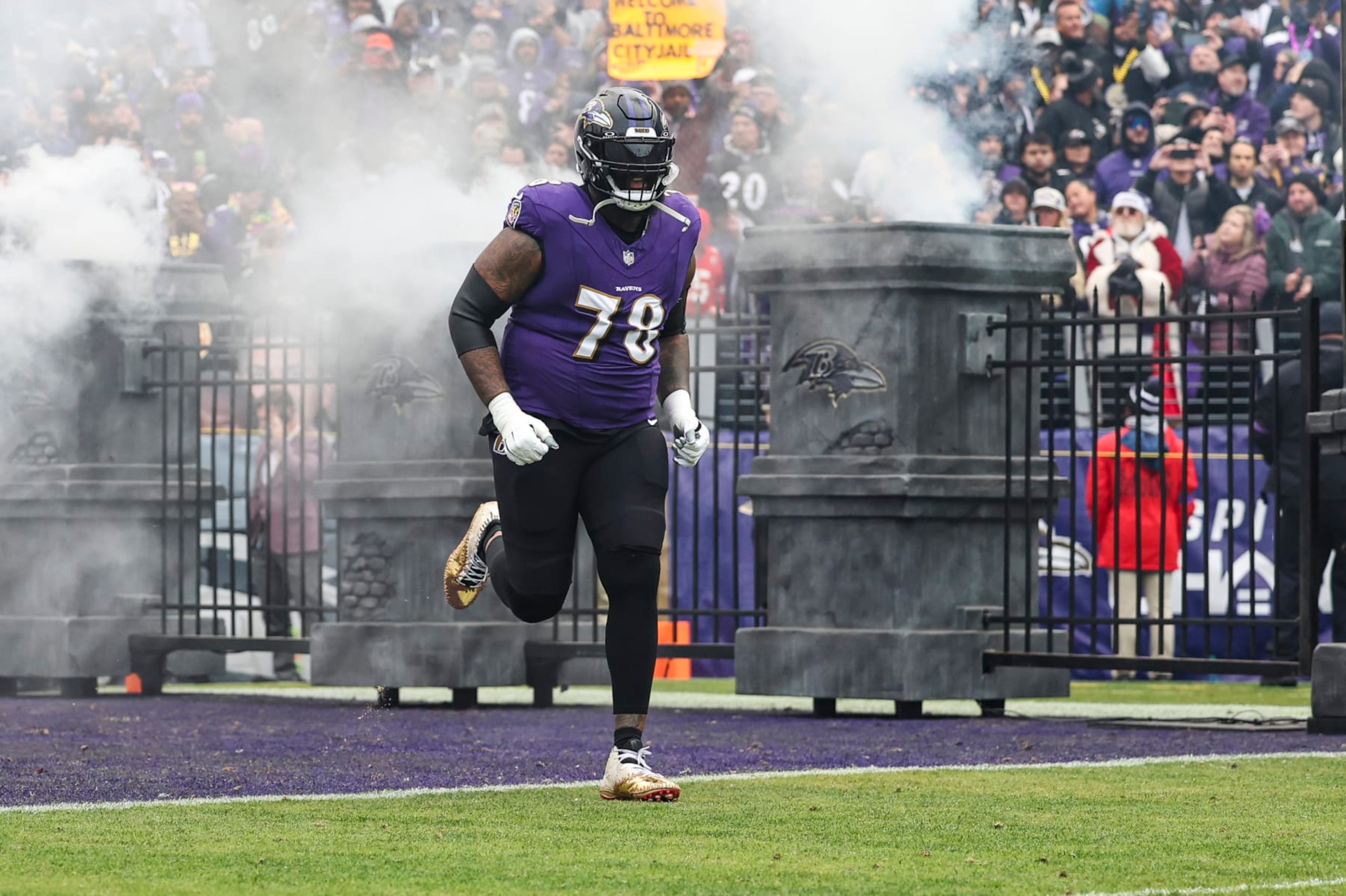 BALTIMORE, MD - JANUARY 28: Morgan Moses #78 of the Baltimore Ravens runs out of the tunnel prior to the AFC Championship NFL football game against the Kansas City Chiefs at M&T Bank Stadium on January 28, 2024 in Baltimore, Maryland. (Photo by Perry Knotts/Getty Images)