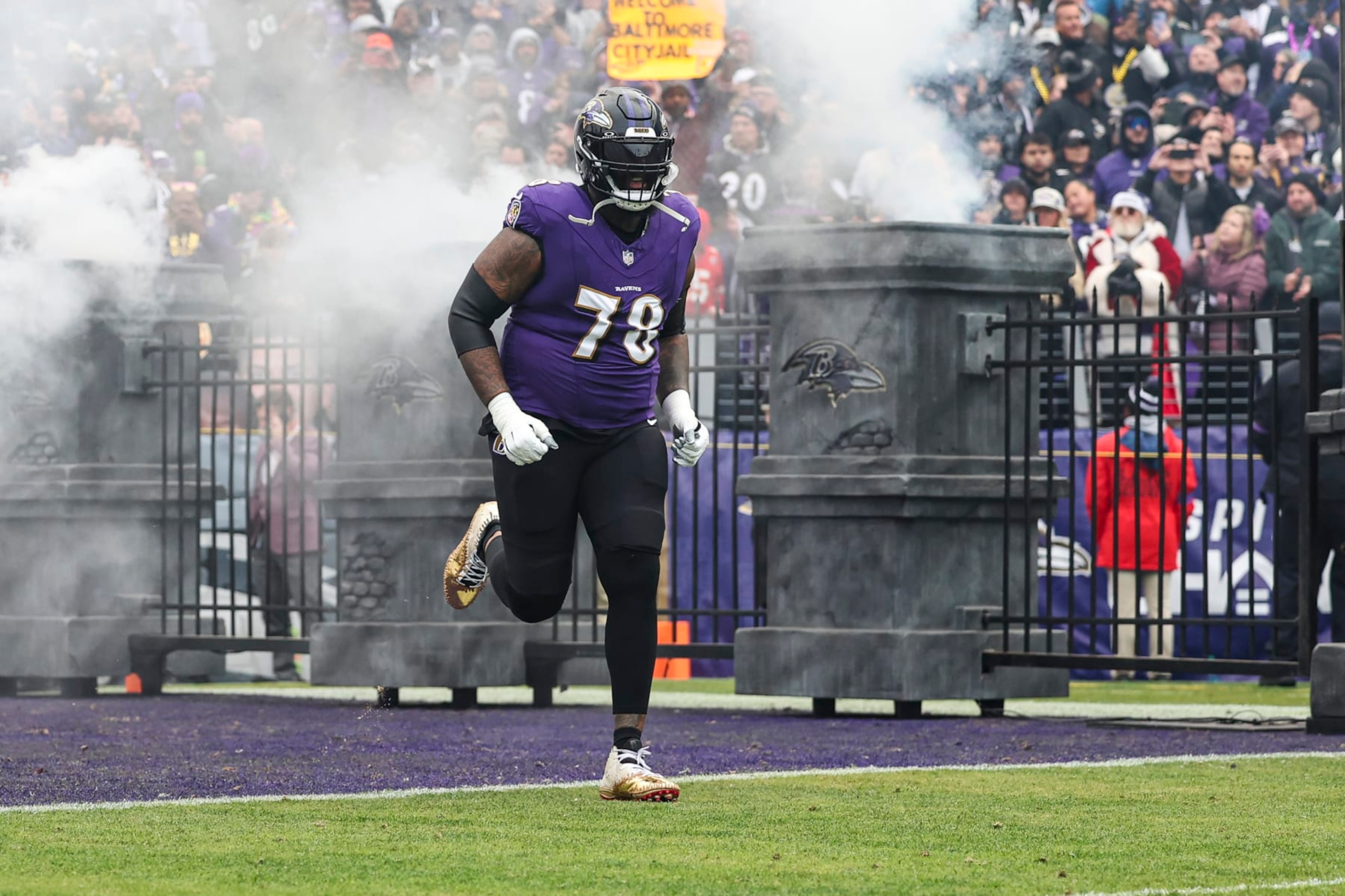 BALTIMORE, MD - JANUARY 28: Morgan Moses #78 of the Baltimore Ravens runs out of the tunnel prior to the AFC Championship NFL football game against the Kansas City Chiefs at M&T Bank Stadium on January 28, 2024 in Baltimore, Maryland. (Photo by Perry Knotts/Getty Images)