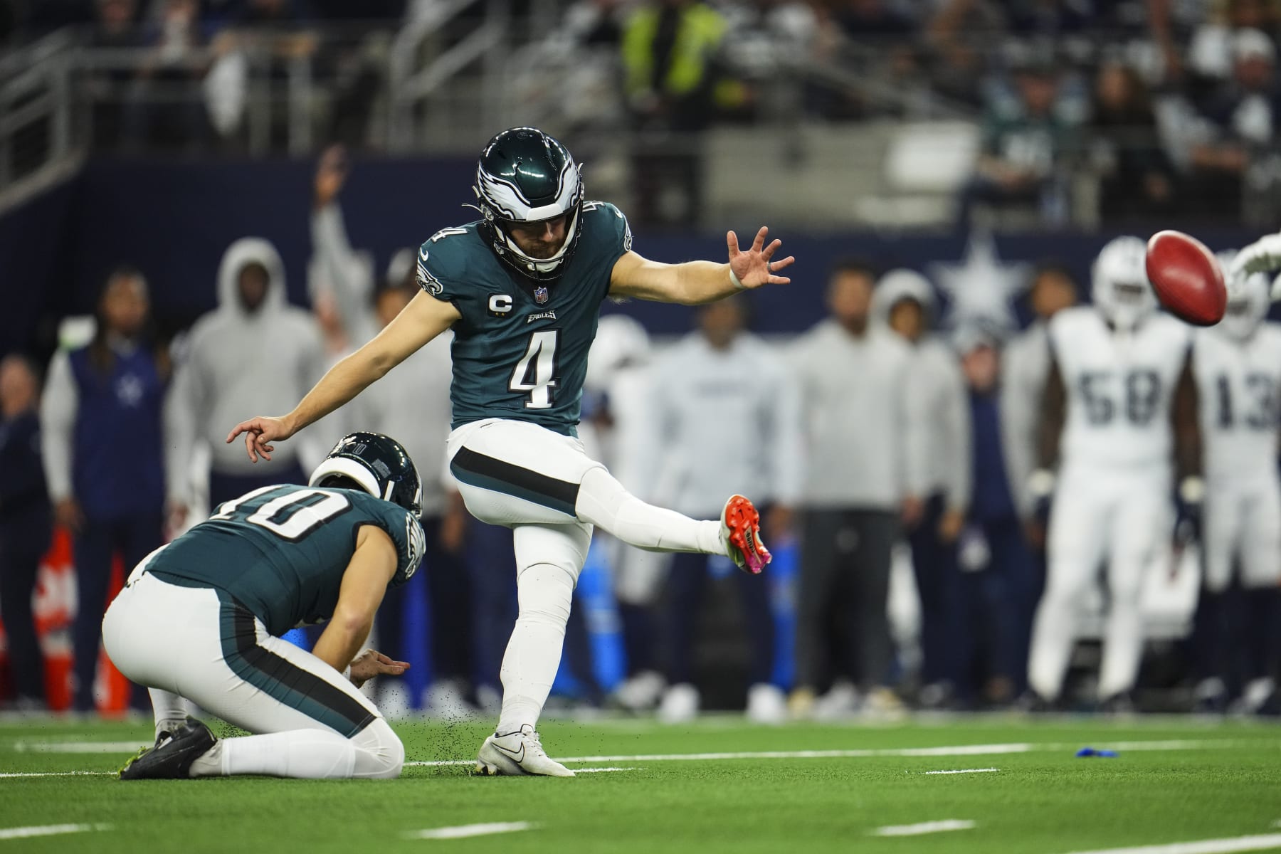 ARLINGTON, TX - DECEMBER 10: Jake Elliott #4 of the Philadelphia Eagles kicks for a field goal during an NFL football game against the Dallas Cowboys at AT&T Stadium on December 10, 2023 in Arlington, Texas. (Photo by Cooper Neill/Getty Images)
