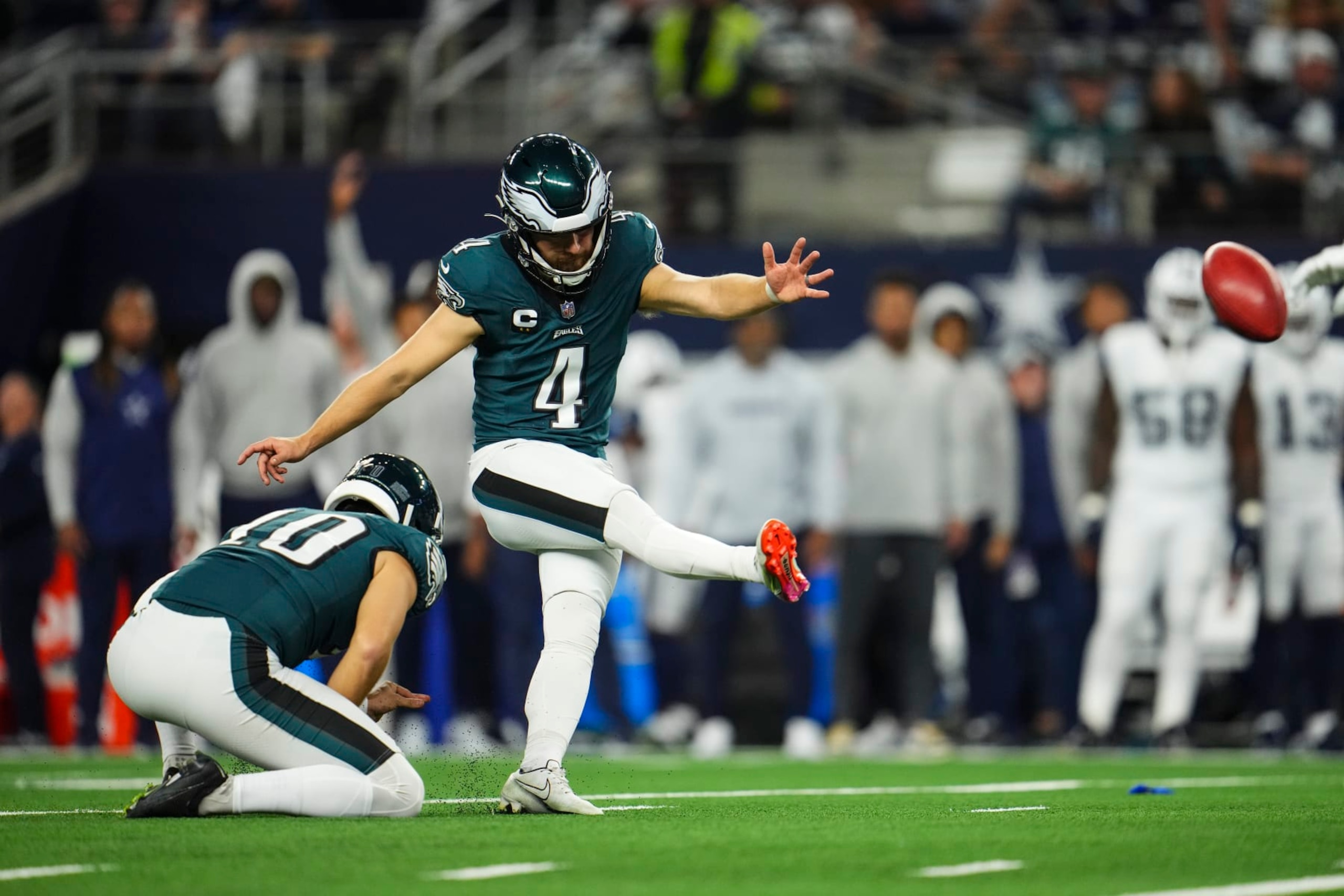 ARLINGTON, TX - DECEMBER 10: Jake Elliott #4 of the Philadelphia Eagles kicks for a field goal during an NFL football game against the Dallas Cowboys at AT&T Stadium on December 10, 2023 in Arlington, Texas. (Photo by Cooper Neill/Getty Images) ARLINGTON, TX - DECEMBER 10: Jake Elliott #4 of the Philadelphia Eagles kicks for a field goal during an NFL football game against the Dallas Cowboys at AT&T Stadium on December 10, 2023 in Arlington, Texas. (Photo by Cooper Neill/Getty Images)