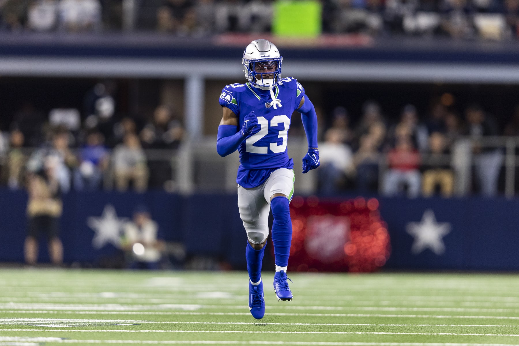 ARLINGTON, TEXAS - NOVEMBER 30: Artie Burns #23 of the Seattle Seahawks runs during an NFL football game between the Dallas Cowboys and the Seattle Seahawks at AT&T Stadium on November 30, 2023 in Arlington, Texas. (Photo by Michael Owens/Getty Images)