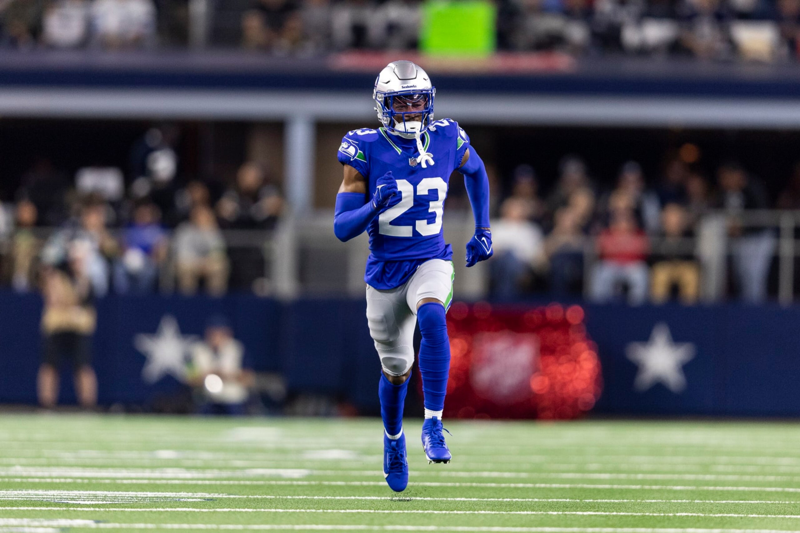ARLINGTON, TEXAS - NOVEMBER 30: Artie Burns #23 of the Seattle Seahawks runs during an NFL football game between the Dallas Cowboys and the Seattle Seahawks at AT&T Stadium on November 30, 2023 in Arlington, Texas. (Photo by Michael Owens/Getty Images)