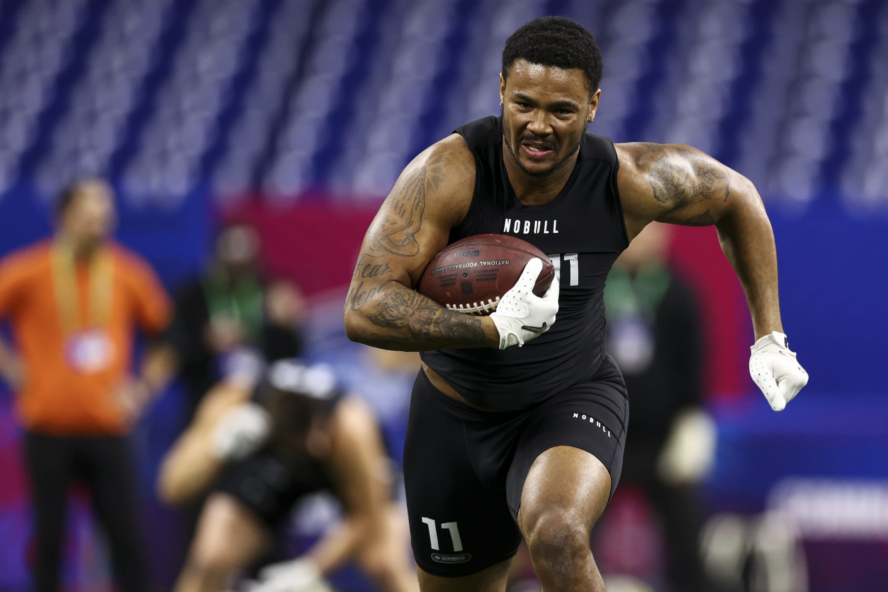 INDIANAPOLIS, INDIANA - MARCH 1: Ja'Tavion Sanders #TE11 of Texas participates in a drill during the NFL Combine at the Lucas Oil Stadium on March 1, 2024 in Indianapolis, Indiana. (Photo by Kevin Sabitus/Getty Images)