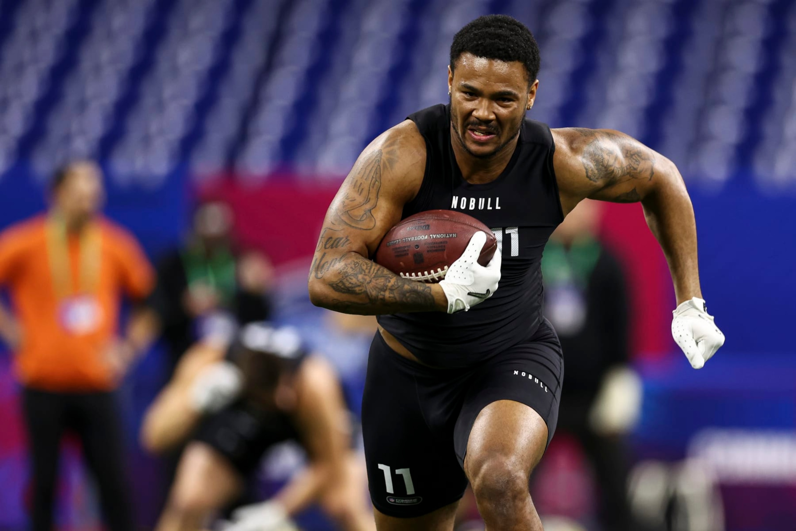 INDIANAPOLIS, INDIANA - MARCH 1: Ja'Tavion Sanders #TE11 of Texas participates in a drill during the NFL Combine at the Lucas Oil Stadium on March 1, 2024 in Indianapolis, Indiana. (Photo by Kevin Sabitus/Getty Images)