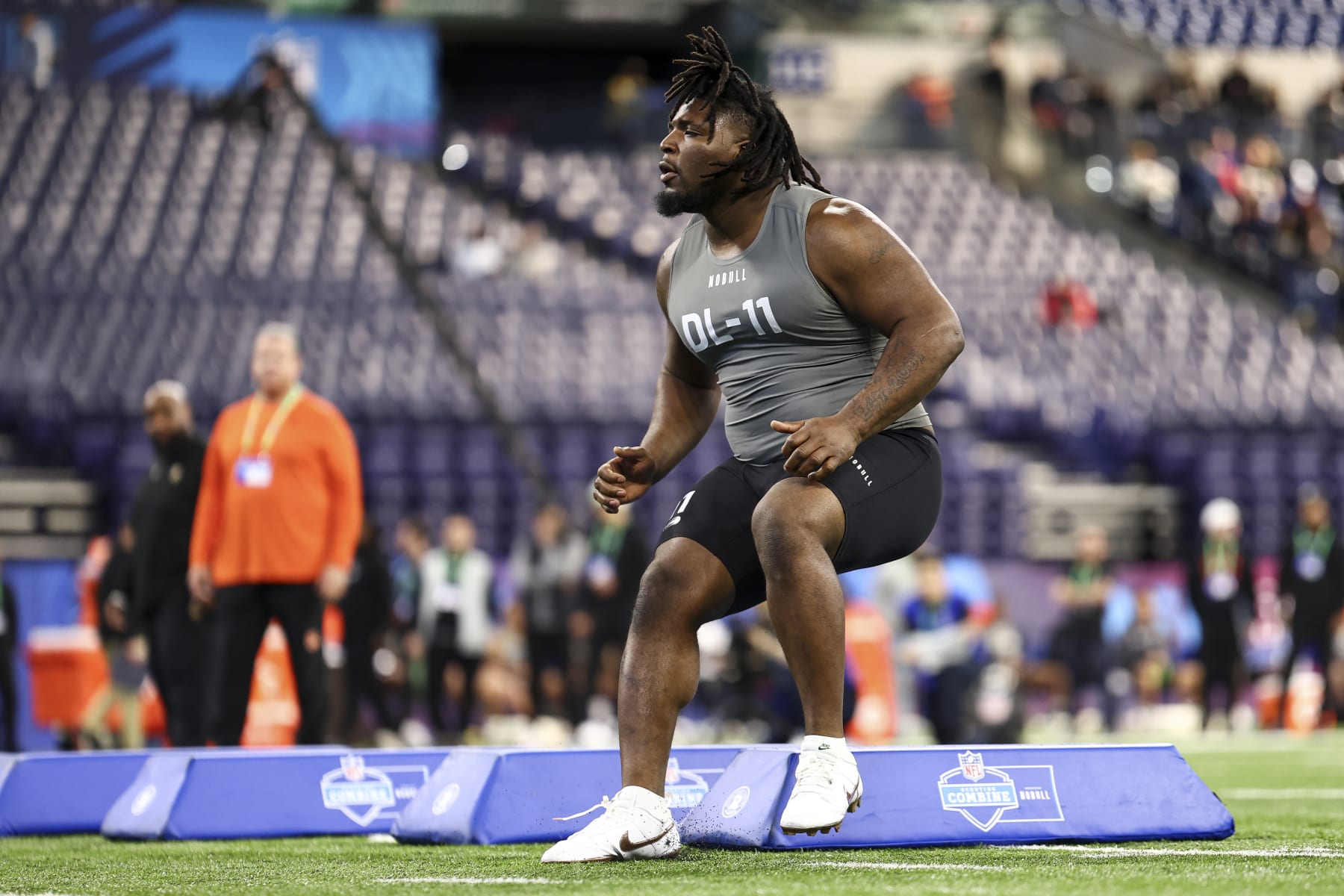 INDIANAPOLIS, INDIANA - FEBRUARY 29: McKinnley Jackson #DL11 of Texas A&M participates in a drill during the NFL Combine at Lucas Oil Stadium on February 29, 2024 in Indianapolis, Indiana. (Photo by Kevin Sabitus/Getty Images)