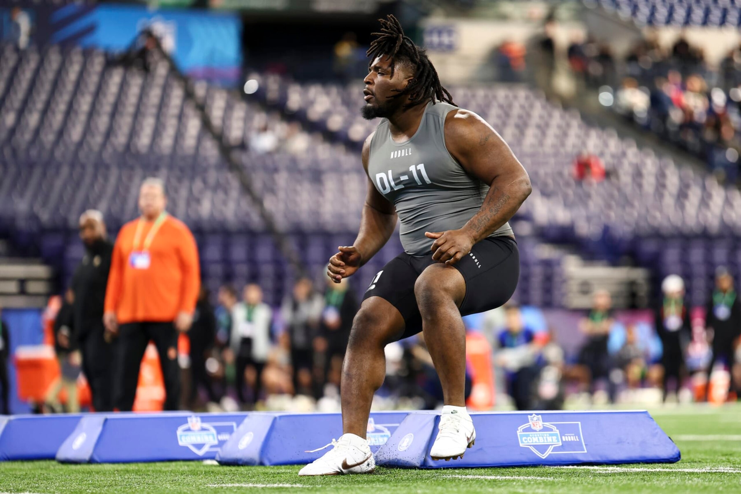 INDIANAPOLIS, INDIANA - FEBRUARY 29: McKinnley Jackson #DL11 of Texas A&M participates in a drill during the NFL Combine at Lucas Oil Stadium on February 29, 2024 in Indianapolis, Indiana. (Photo by Kevin Sabitus/Getty Images)