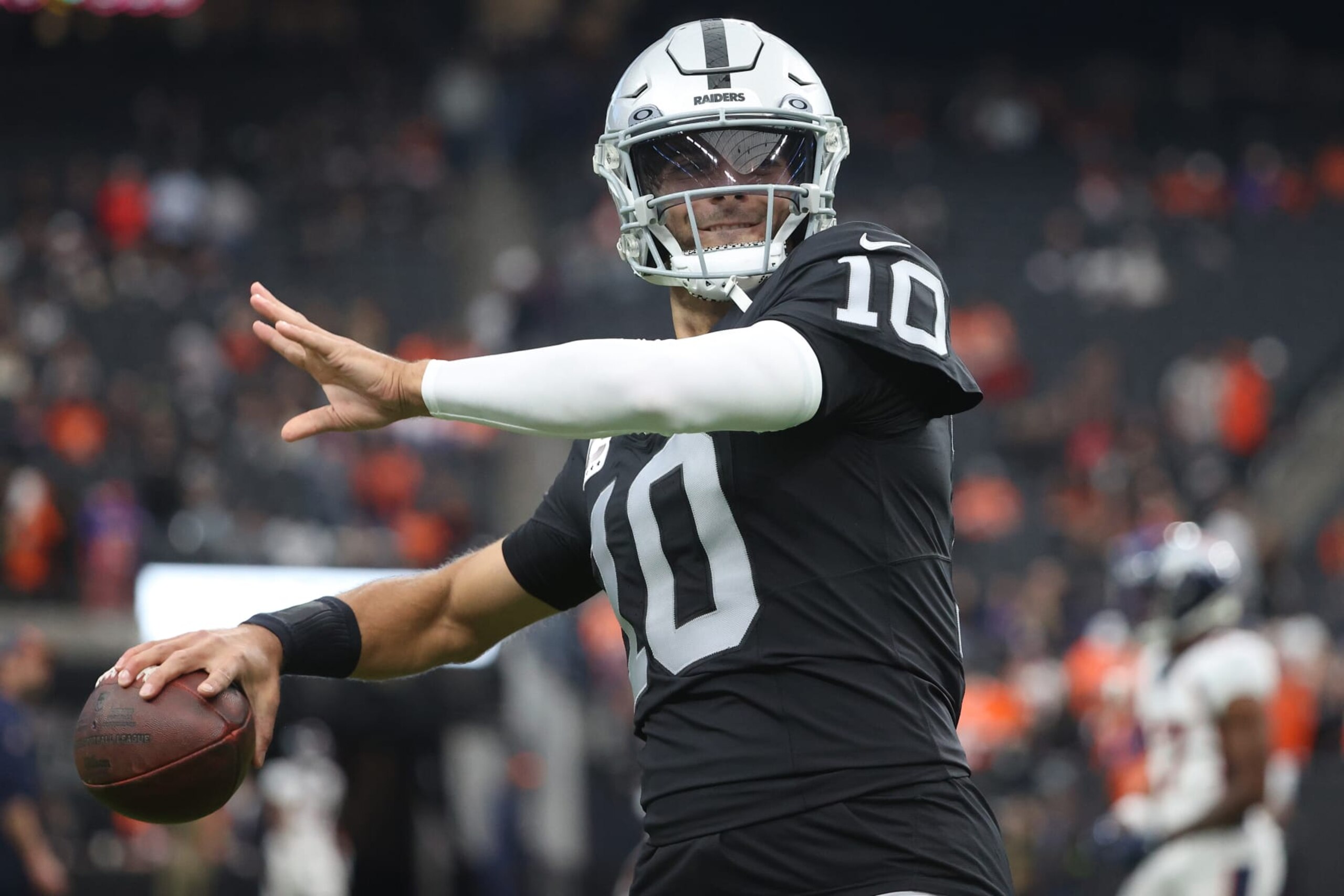 LAS VEGAS, NEVADA - JANUARY 07: Jimmy Garoppolo #10 of the Las Vegas Raiders warms up prior to the game against the Denver Broncos at Allegiant Stadium on January 07, 2024 in Las Vegas, Nevada. (Photo by Ian Maule/Getty Images)