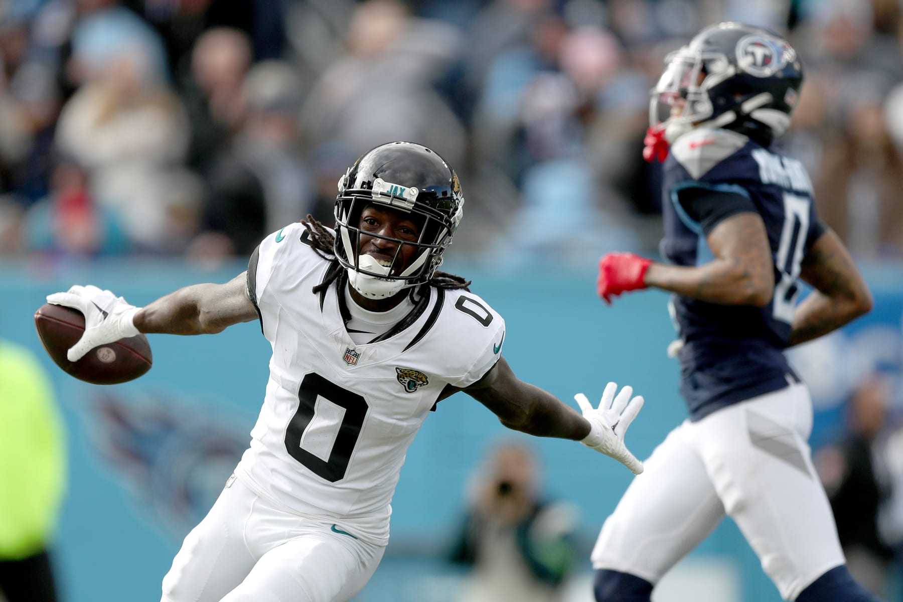 NASHVILLE, TENNESSEE - JANUARY 07: Calvin Ridley #0 of the Jacksonville Jaguars celebrates a touchdown catch during the first half against the Tennessee Titans at Nissan Stadium on January 07, 2024 in Nashville, Tennessee. (Photo by Justin Ford/Getty Images)
