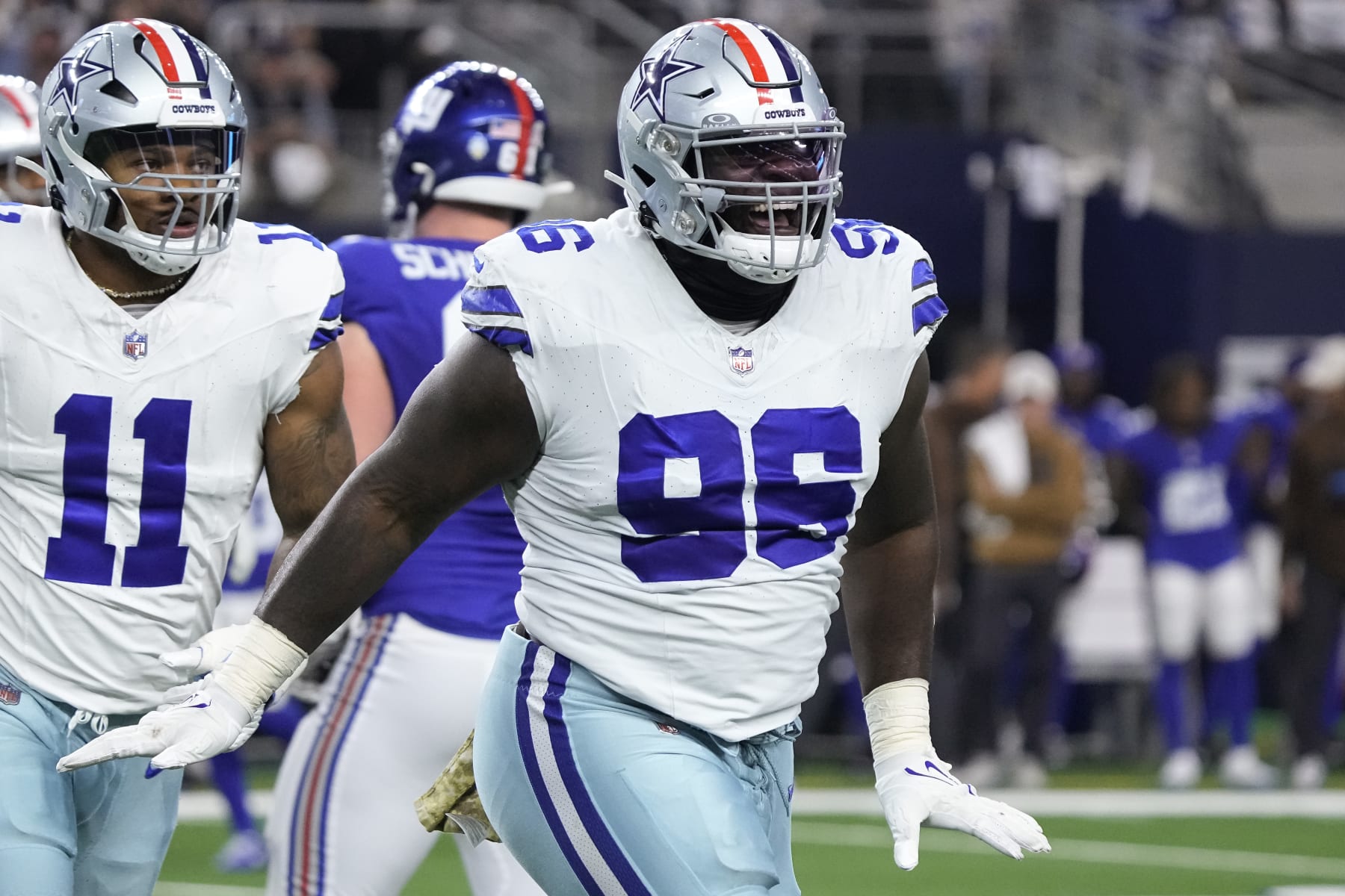 ARLINGTON, TEXAS - NOVEMBER 12: Neville Gallimore #96 of the Dallas Cowboys celebrates after a sack during the first half of the game against the New York Giants at AT&T Stadium on November 12, 2023 in Arlington, Texas. (Photo by Sam Hodde/Getty Images) ARLINGTON, TEXAS - NOVEMBER 12: Neville Gallimore #96 of the Dallas Cowboys celebrates after a sack during the first half of the game against the New York Giants at AT&T Stadium on November 12, 2023 in Arlington, Texas. (Photo by Sam Hodde/Getty Images)