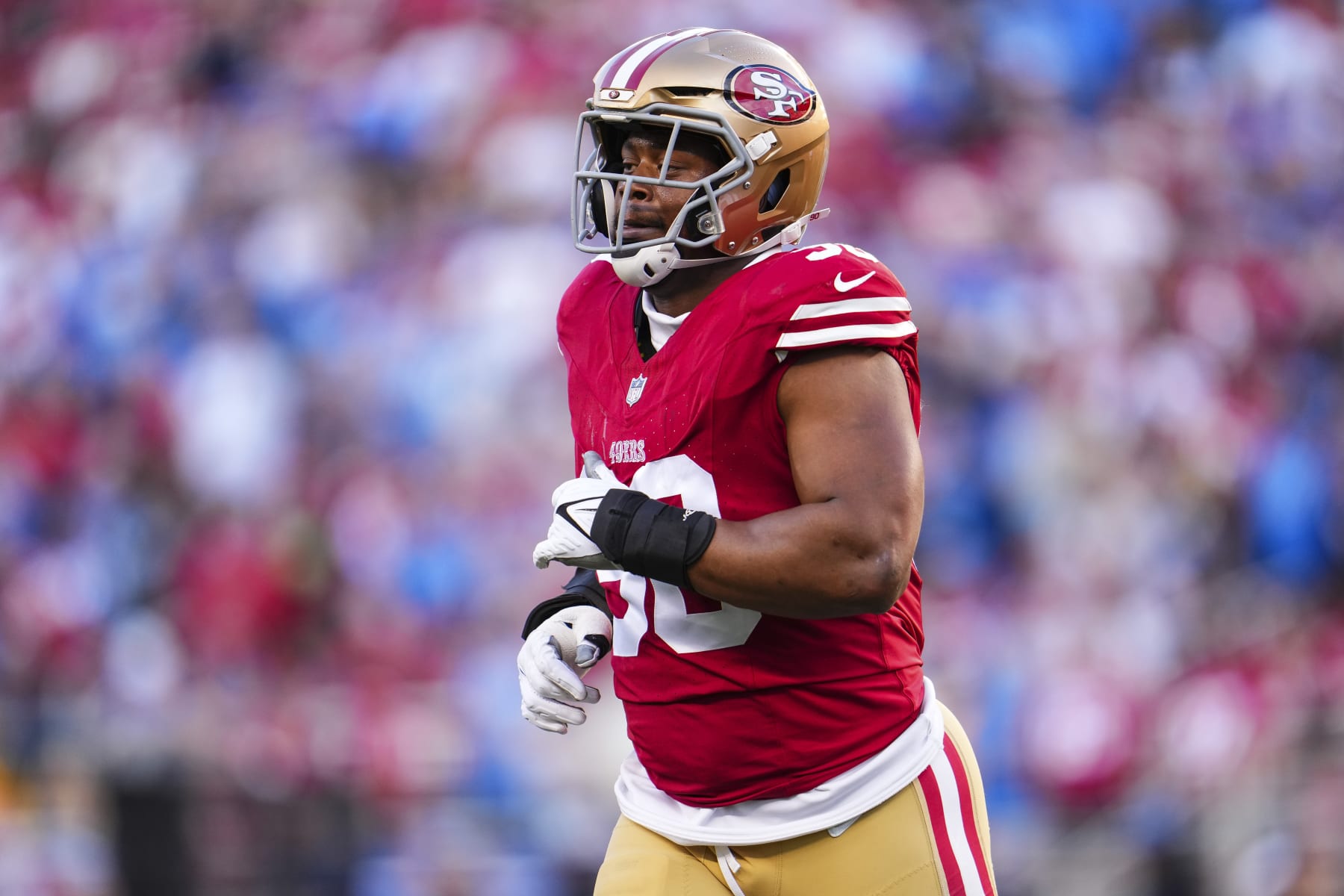 SANTA CLARA, CA - JANUARY 28: Kevin Givens #90 of the San Francisco 49ers looks on from the field during the NFC Championship NFL football game against the Detroit Lions at Levi's Stadium on January 28, 2024 in Santa Clara, California. (Photo by Cooper Neill/Getty Images)
