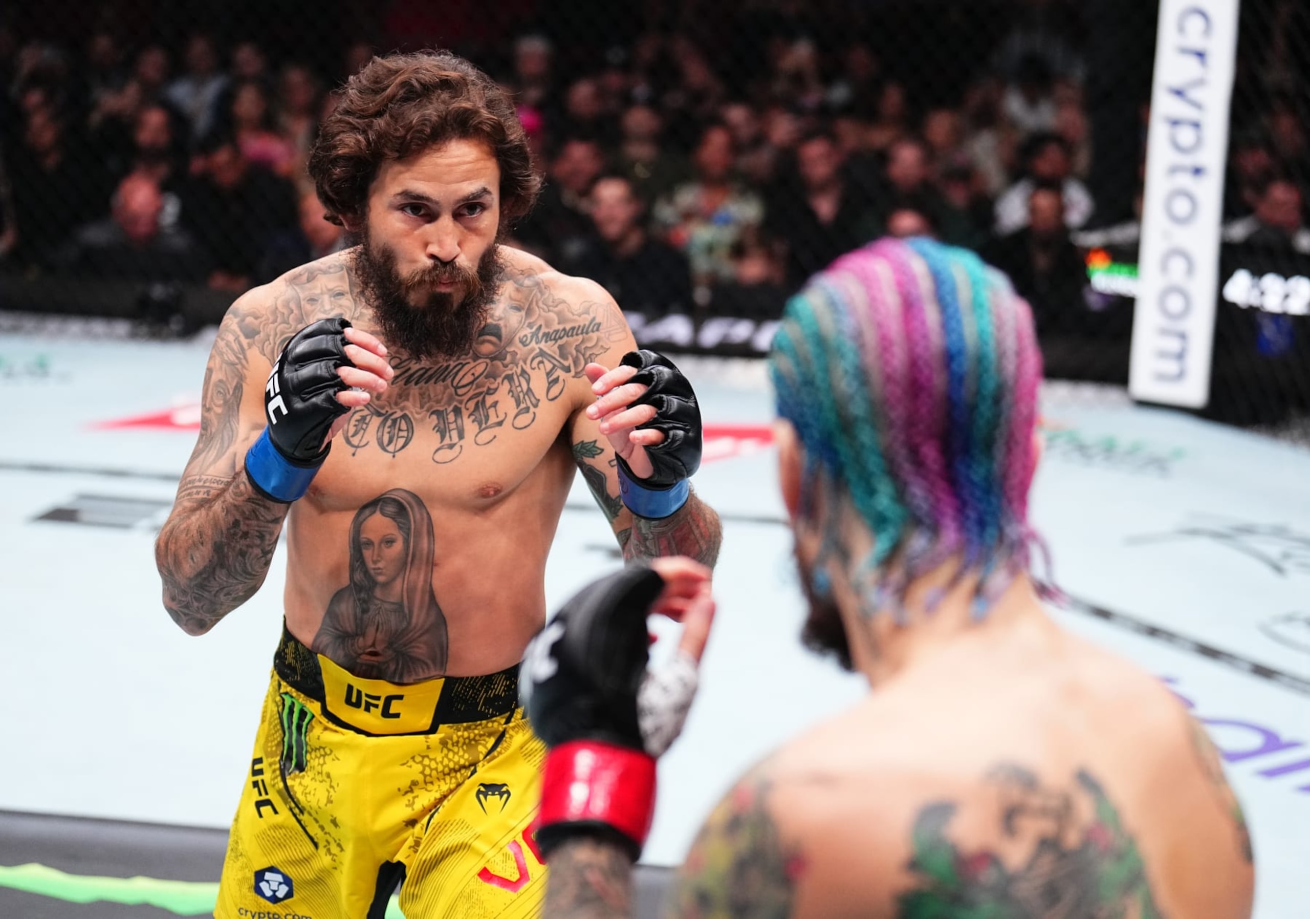 MIAMI, FLORIDA - MARCH 09: Marlon Vera of Ecuador battles Sean O'Malley in the UFC bantamweight championship fight during the UFC 299 event at Kaseya Center on March 09, 2024 in Miami, Florida. (Photo by Chris Unger/Zuffa LLC via Getty Images)