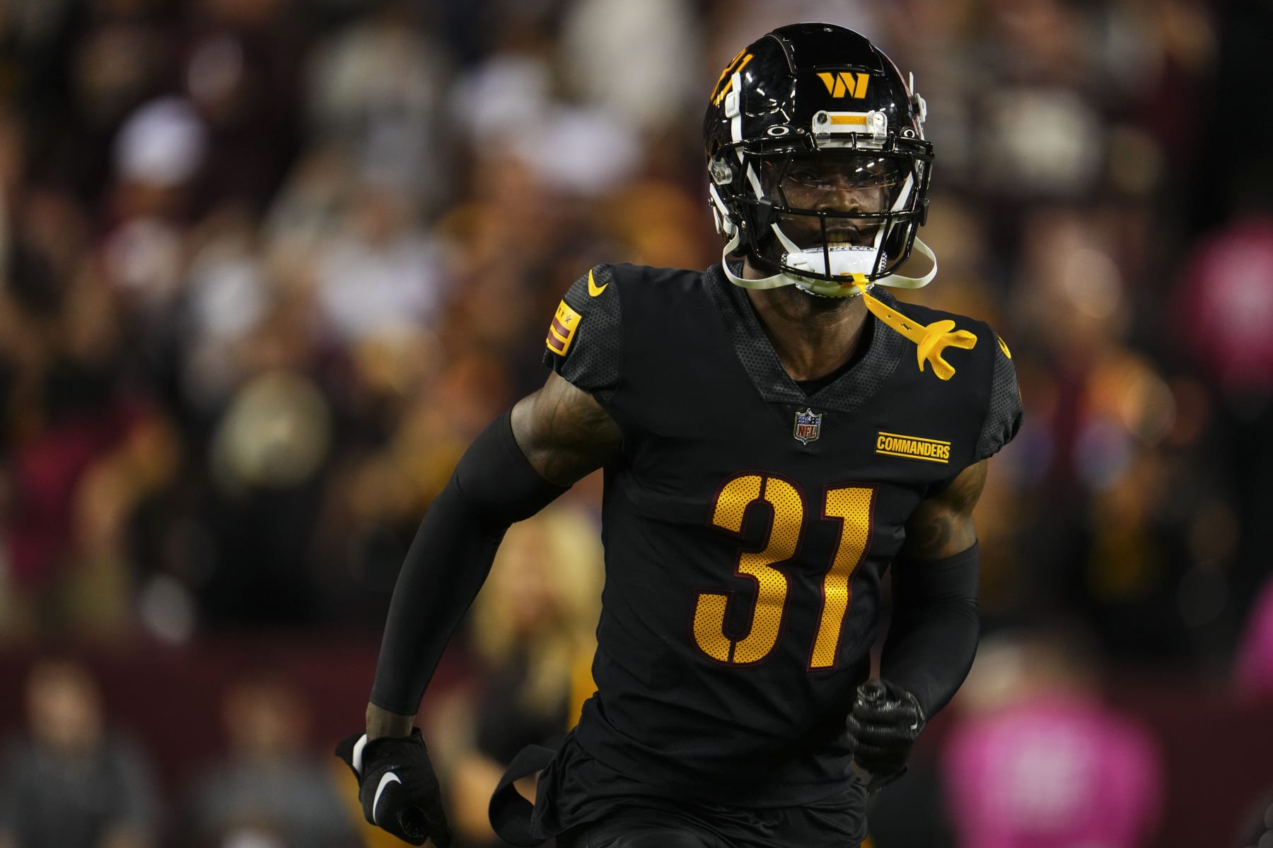 LANDOVER, MD - OCTOBER 05: Kamren Curl #31 of the Washington Commanders runs out of the tunnel prior to an NFL game against the Chicago Bears at FedEx Field on October 5, 2023 in Landover, Maryland. (Photo by Cooper Neill/Getty Images)