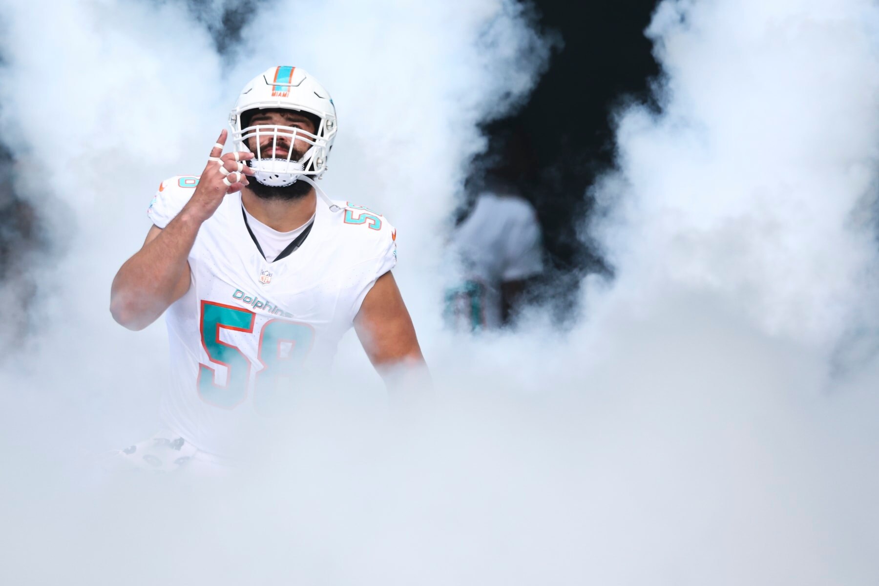 MIAMI GARDENS, FL - NOVEMBER 19: Connor Williams #58 of the Miami Dolphins runs onto the field prior to an NFL football game against the Las Vegas Raiders at Hard Rock Stadium on November 19, 2023 in Miami Gardens, Florida. (Photo by Kevin Sabitus/Getty Images)