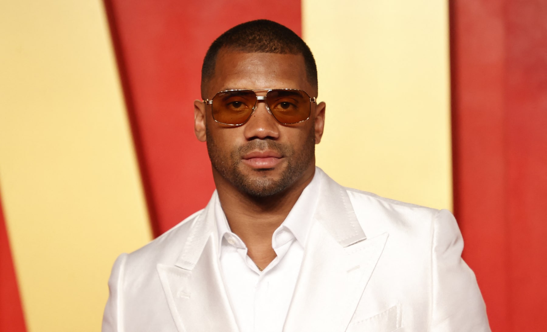 US football quarterback Russell Wilson attends the Vanity Fair Oscars Party at the Wallis Annenberg Center for the Performing Arts in Beverly Hills, California, on March 10, 2024. (Photo by Michael TRAN / AFP) (Photo by MICHAEL TRAN/AFP via Getty Images)
