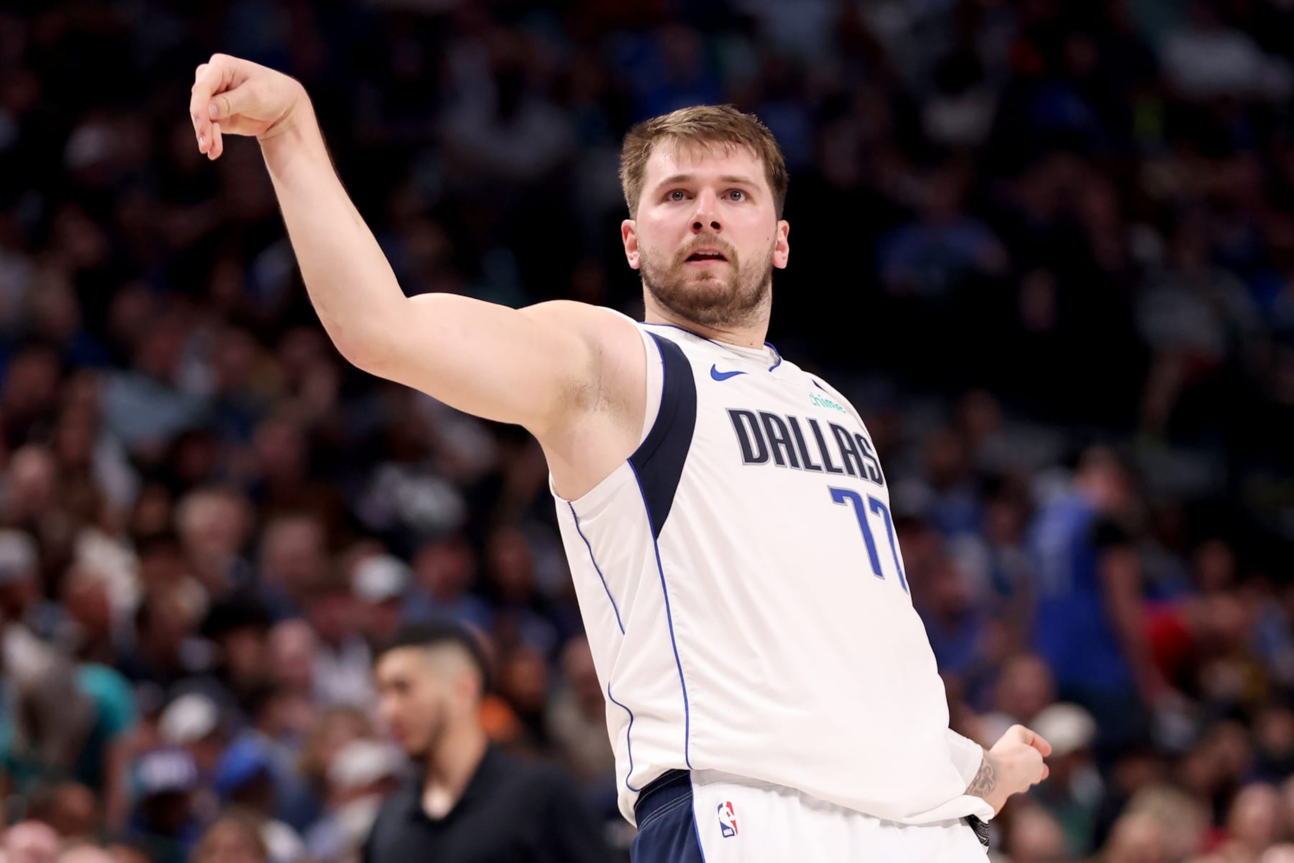 DALLAS, TEXAS - MARCH 13: Luka Doncic #77 of the Dallas Mavericks watches a shot against the Golden State Warriors in the first half at American Airlines Center on March 13, 2024 in Dallas, Texas. NOTE TO USER: User expressly acknowledges and agrees that, by downloading and or using this photograph, User is consenting to the terms and conditions of the Getty Images License Agreement. (Photo by Tim Heitman/Getty Images) DALLAS, TEXAS - MARCH 13: Luka Doncic #77 of the Dallas Mavericks watches a shot against the Golden State Warriors in the first half at American Airlines Center on March 13, 2024 in Dallas, Texas. NOTE TO USER: User expressly acknowledges and agrees that, by downloading and or using this photograph, User is consenting to the terms and conditions of the Getty Images License Agreement. (Photo by Tim Heitman/Getty Images)