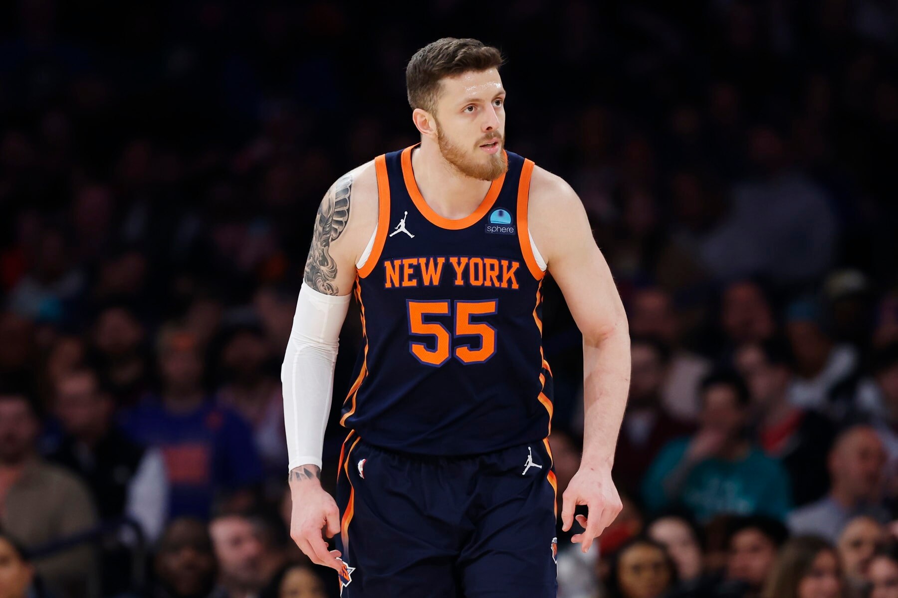 NEW YORK, NEW YORK - MARCH 08: Isaiah Hartenstein #55 of the New York Knicks looks on during the first half against the Orlando Magic at Madison Square Garden on March 08, 2024 in New York City. NOTE TO USER: User expressly acknowledges and agrees that, by downloading and or using this photograph, User is consenting to the terms and conditions of the Getty Images License Agreement. (Photo by Sarah Stier/Getty Images)