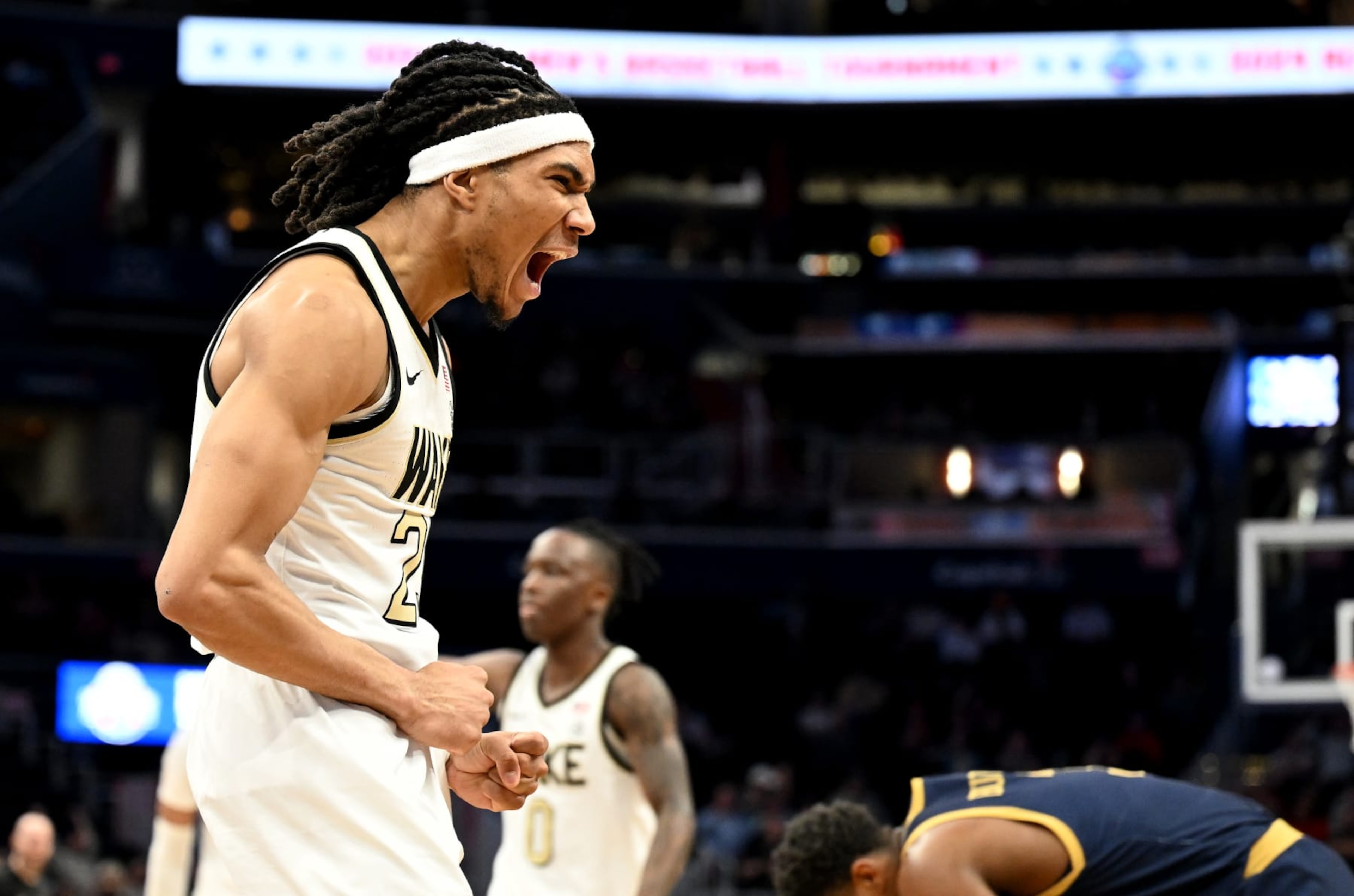 WASHINGTON, DC - MARCH 13: Hunter Sallis #23 of the Wake Forest Demon Deacons celebrates in the first half against the Notre Dame Fighting Irish in the Second Round of the ACC Men's Basketball Tournament at Capital One Arena on March 13, 2024 in Washington, DC. (Photo by Greg Fiume/Getty Images) WASHINGTON, DC - MARCH 13: Hunter Sallis #23 of the Wake Forest Demon Deacons celebrates in the first half against the Notre Dame Fighting Irish in the Second Round of the ACC Men's Basketball Tournament at Capital One Arena on March 13, 2024 in Washington, DC. (Photo by Greg Fiume/Getty Images)